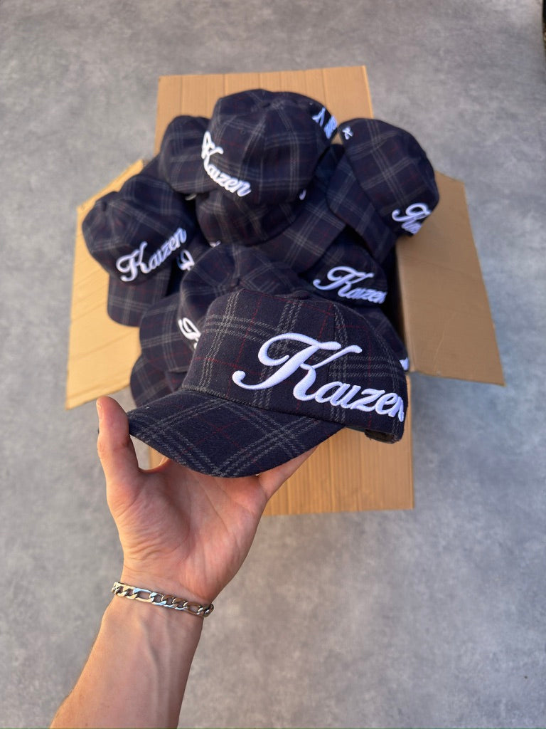 Logo view of Kaizen Market Script Plaid Hat