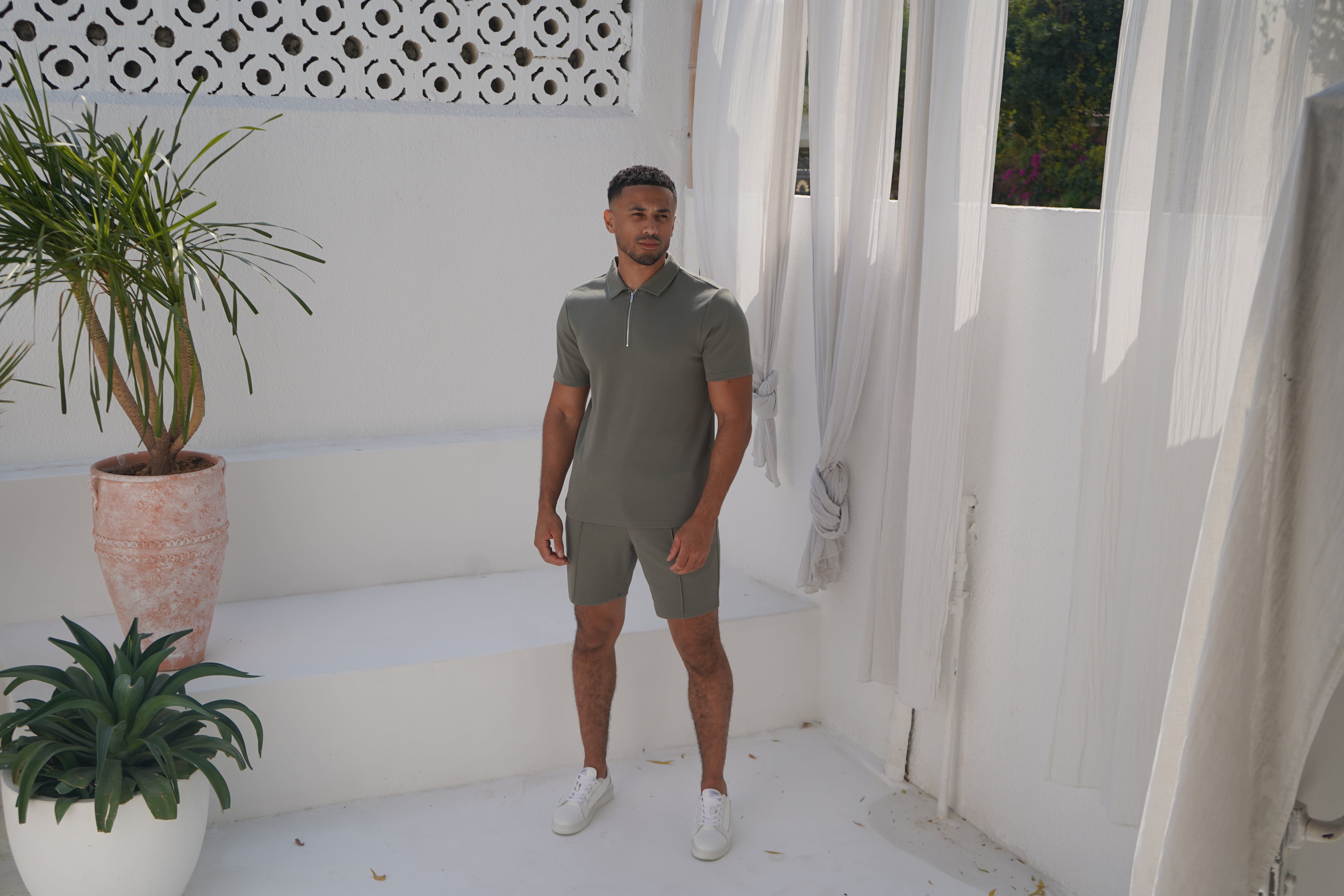 Model view of textured Light Olive Shorts