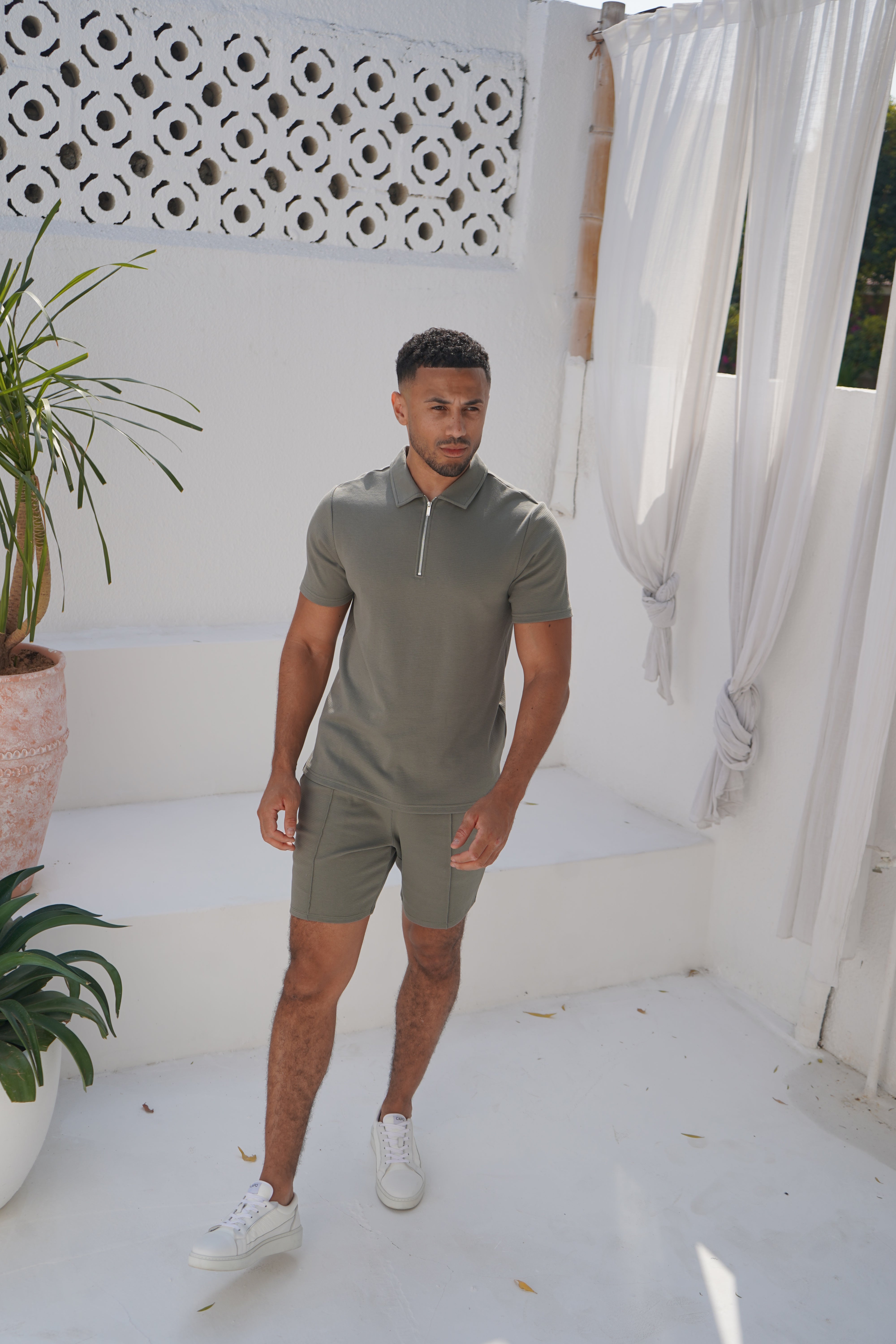 Model view of textured Light Olive Shorts