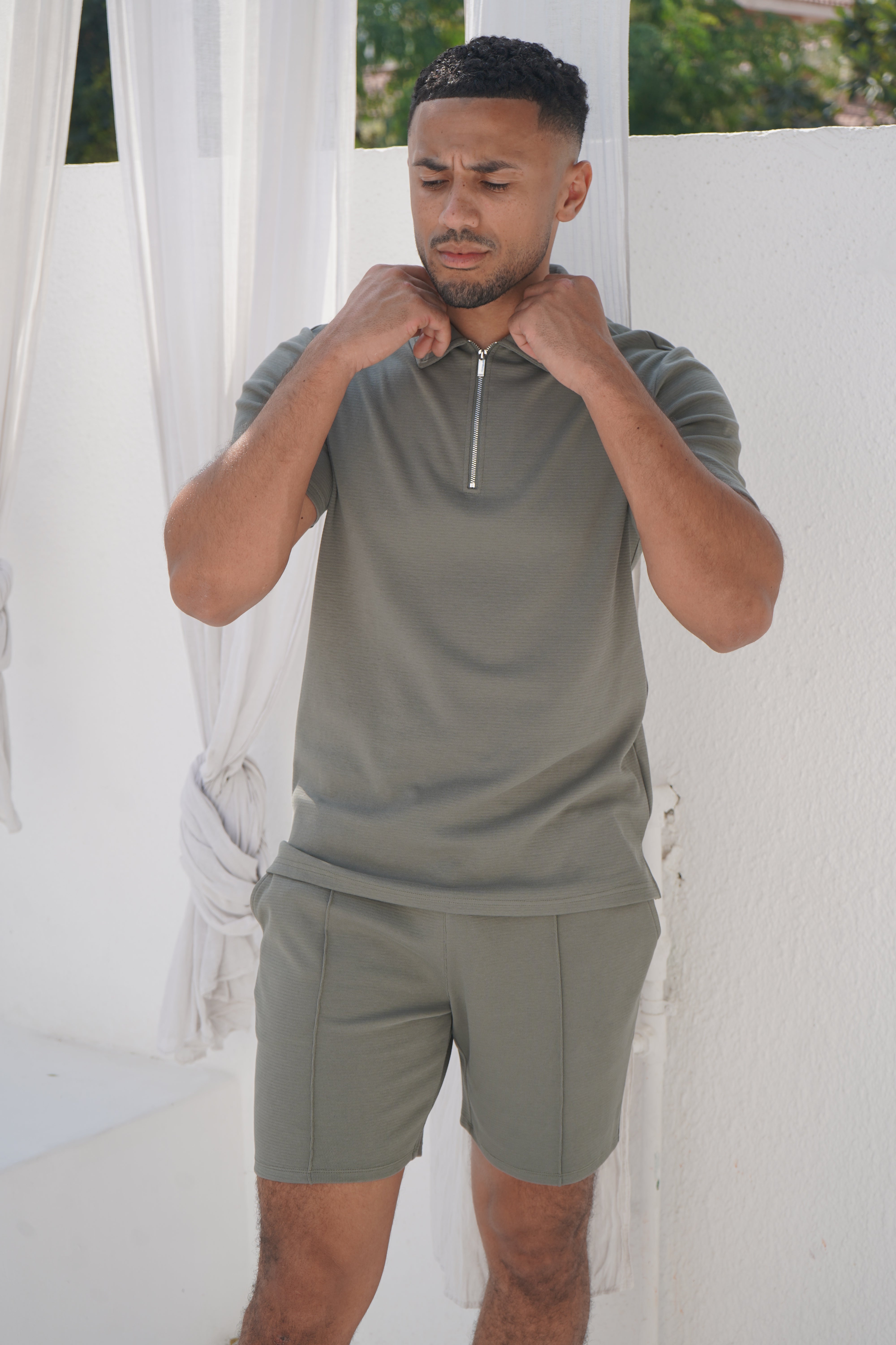 Model view of textured Light Olive Shorts