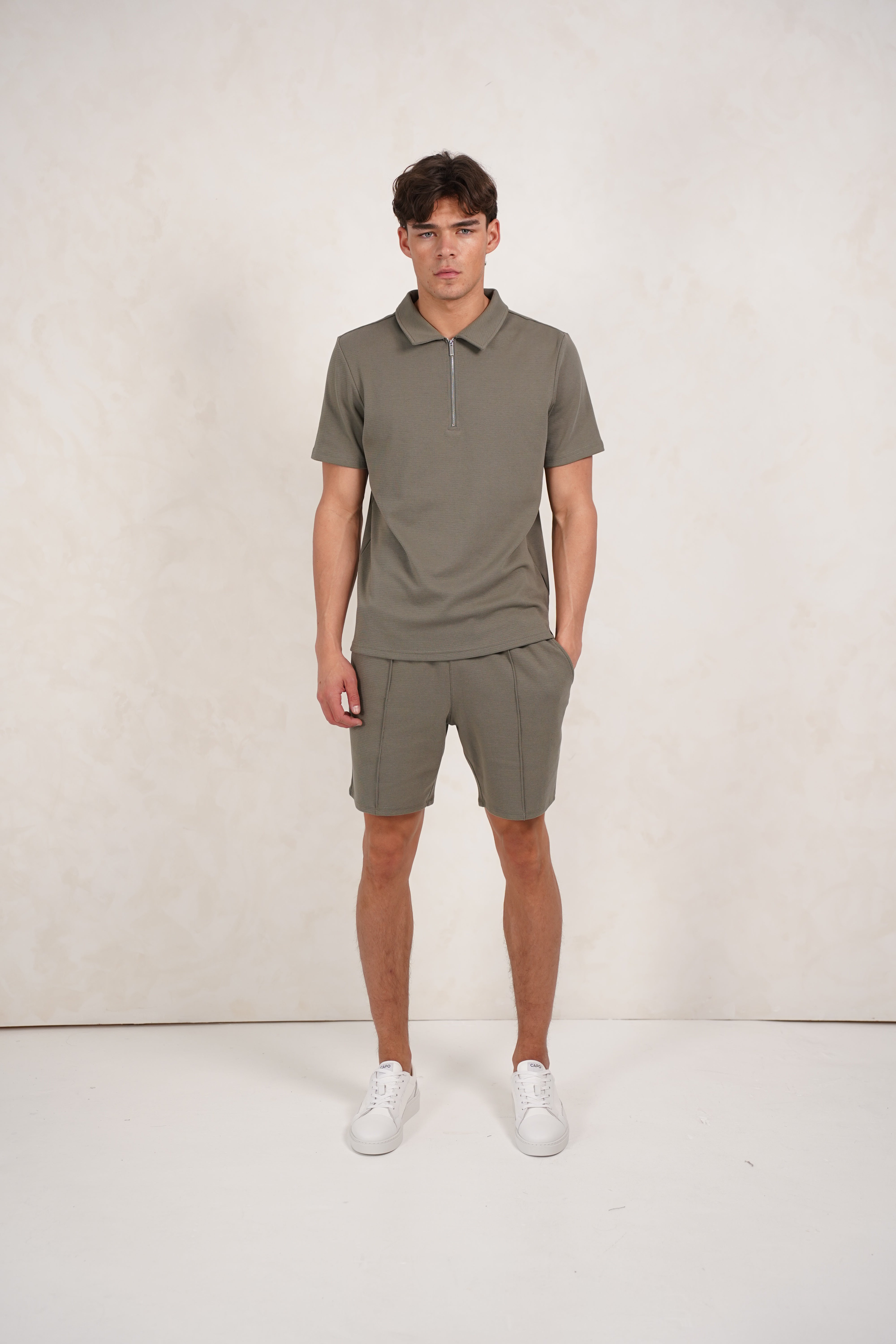 Model view of textured Light Olive Shorts