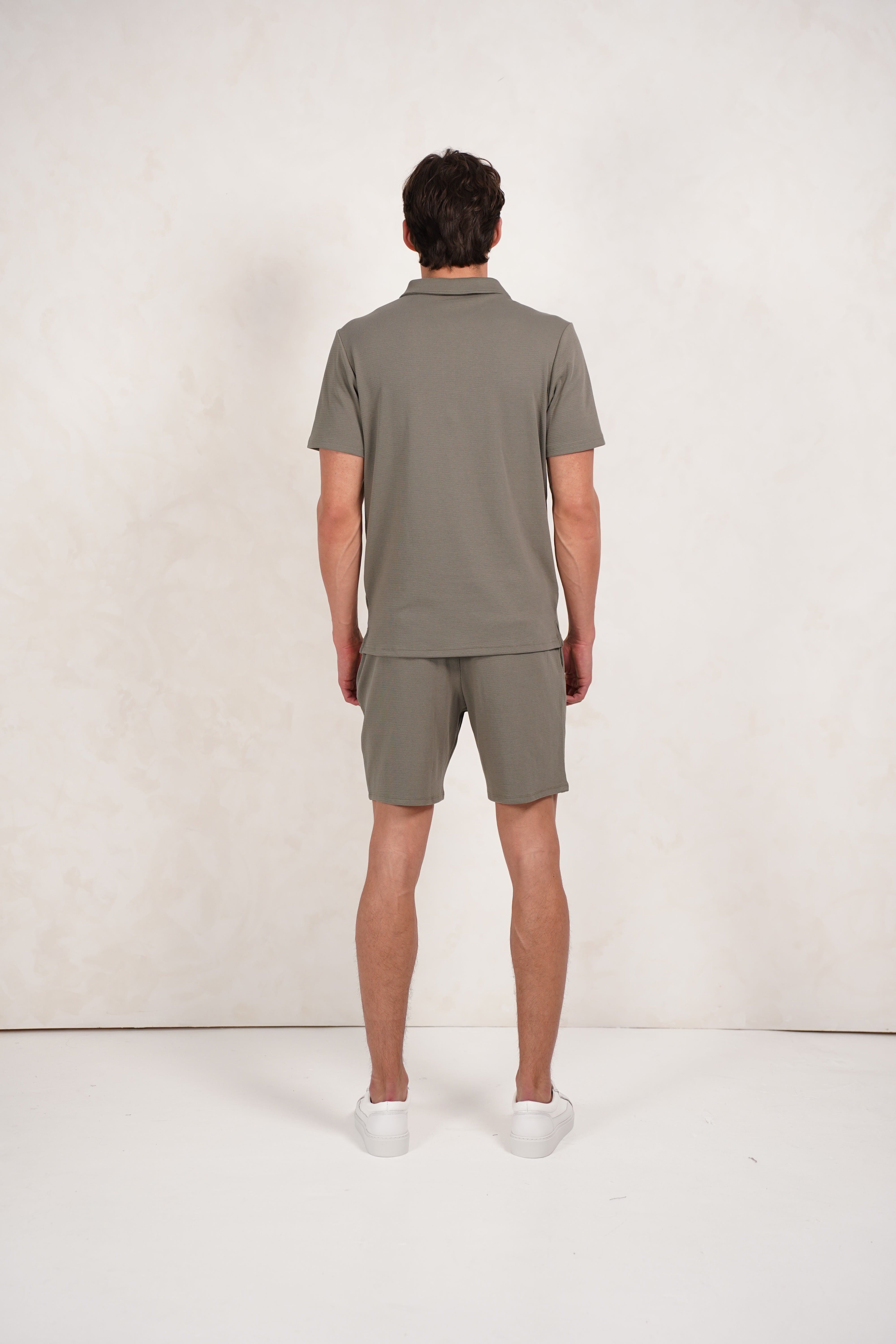 Back view of textured Light Olive Shorts