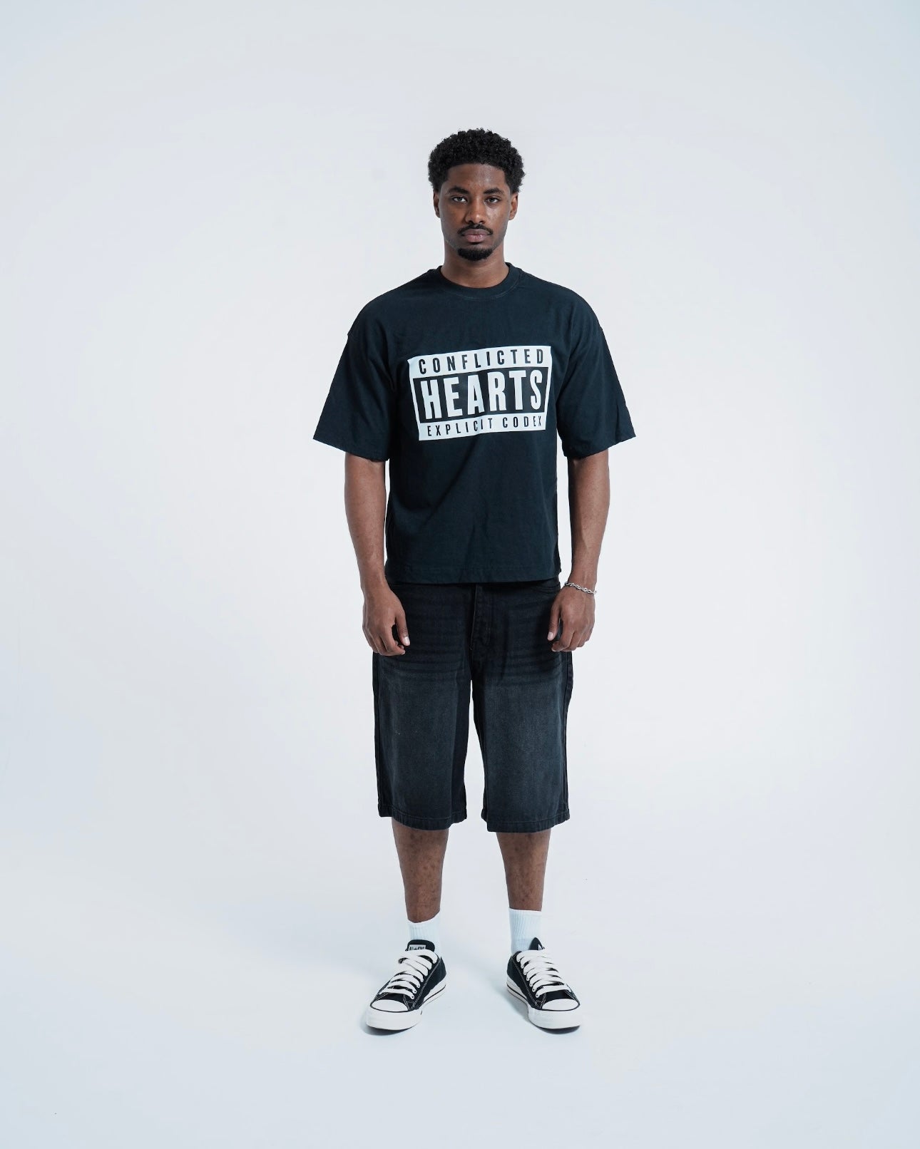 Model view of Conflicted Hearts Fractured Graphic Jet Black T-Shirt