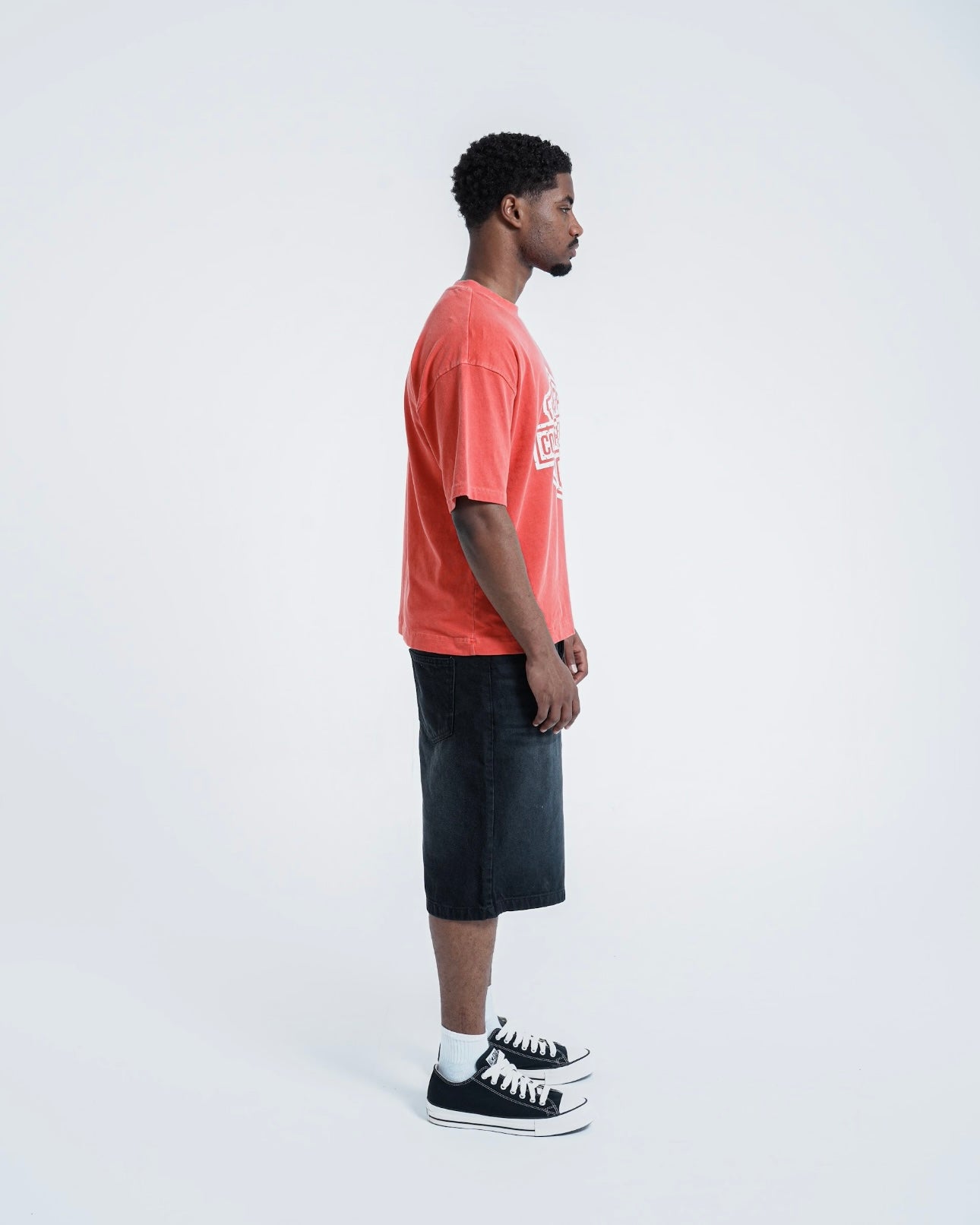 Model view of Conflicted Hearts Retro Graphic Coral Pink T-Shirt