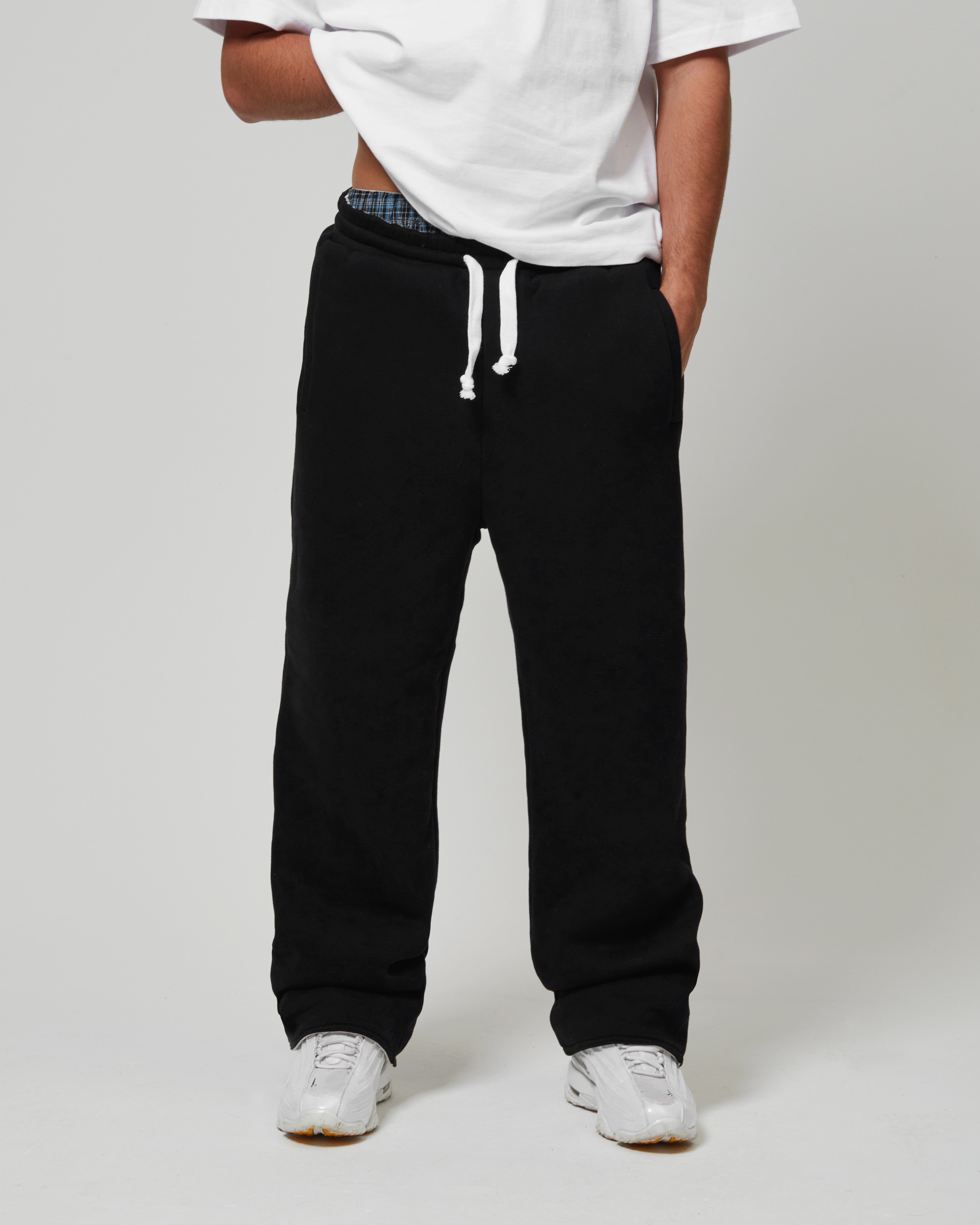Front view of Kaizen Market Reversible Grey Black Sweatpants