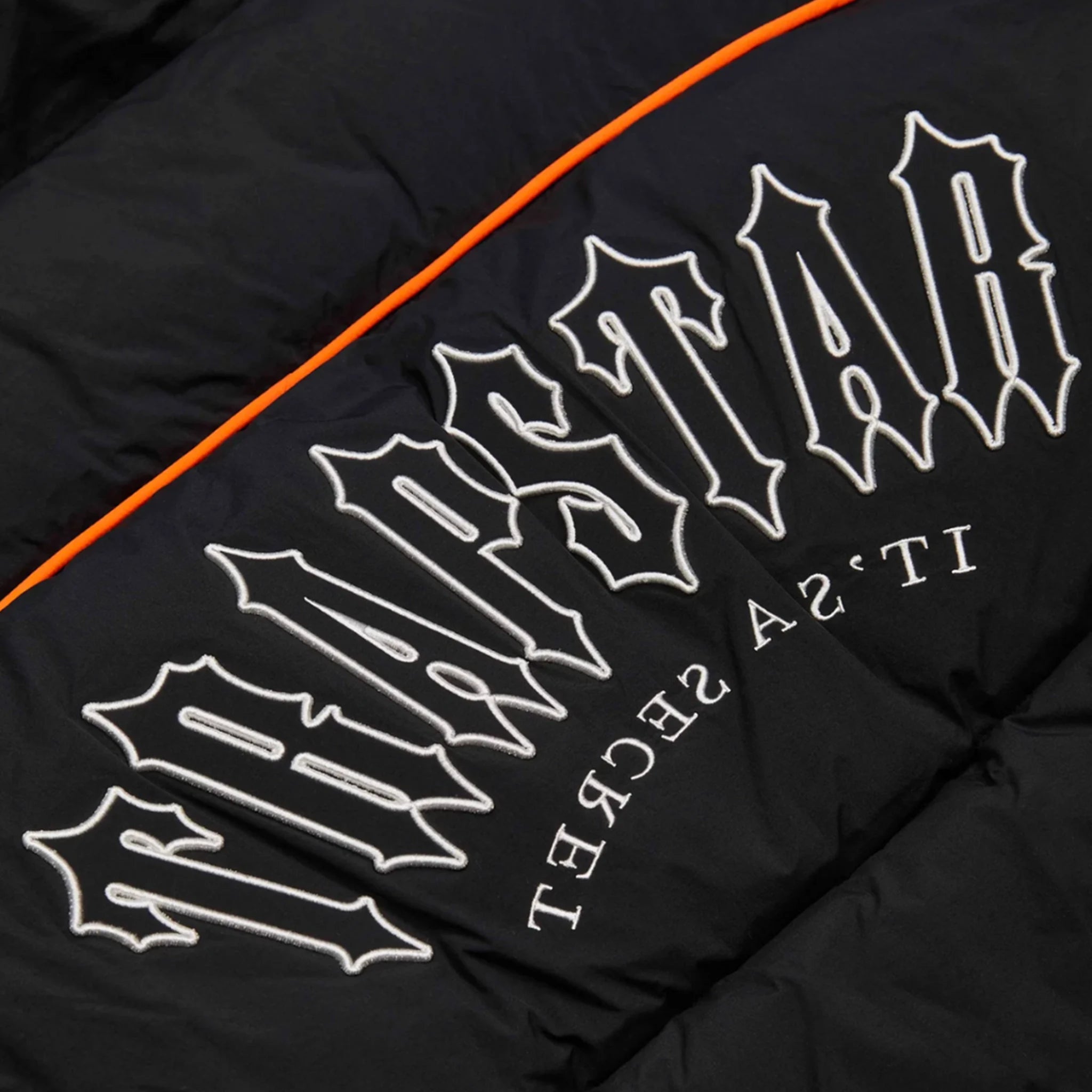Back logo view of Trapstar Irongate Arch Piping Black Puffer