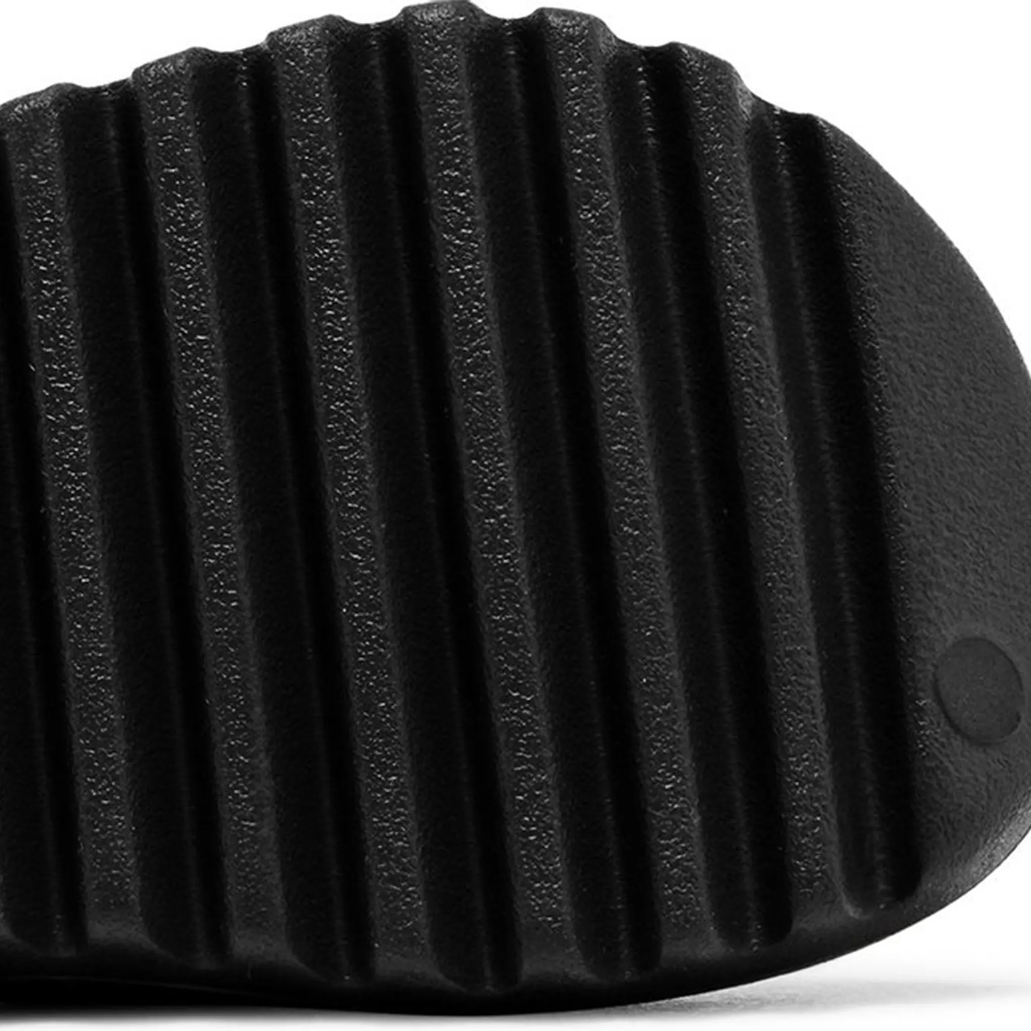 Sole Detail view of Adidas Yeezy Slide Kids Dark Onyx ID5104