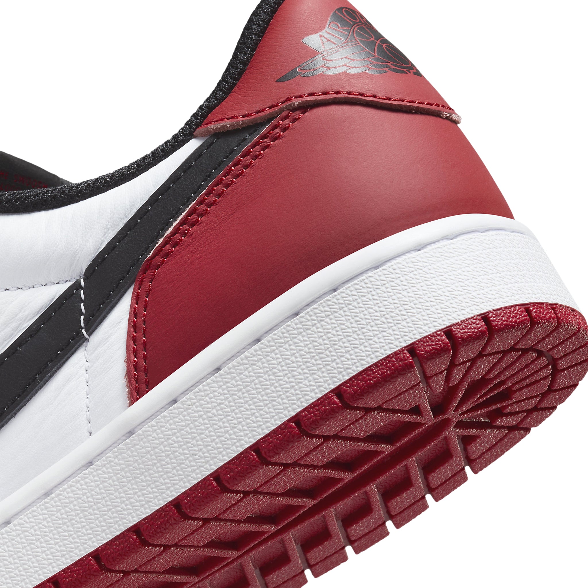 Hee side view of Air Jordan 1 Low Black Toe CZ0790-106