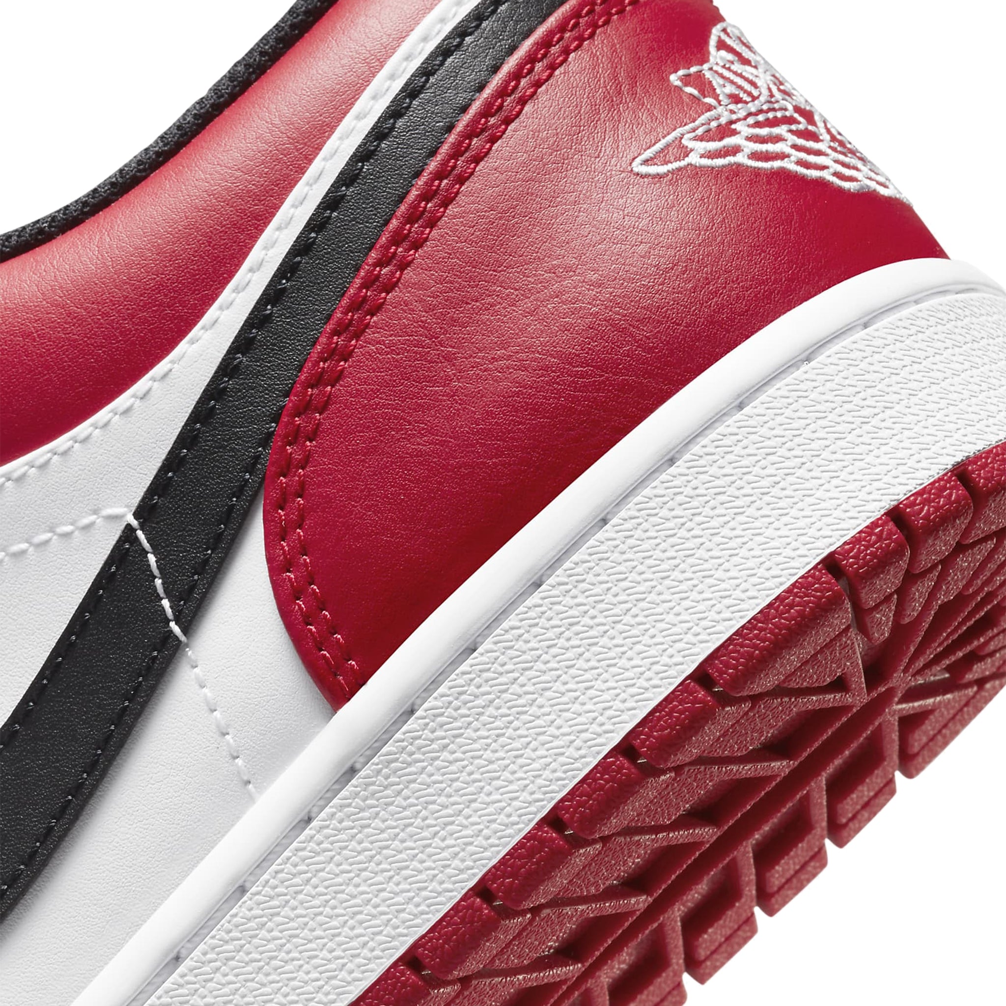 Logo view of Air Jordan 1 Low Bred Toe 553558-612
