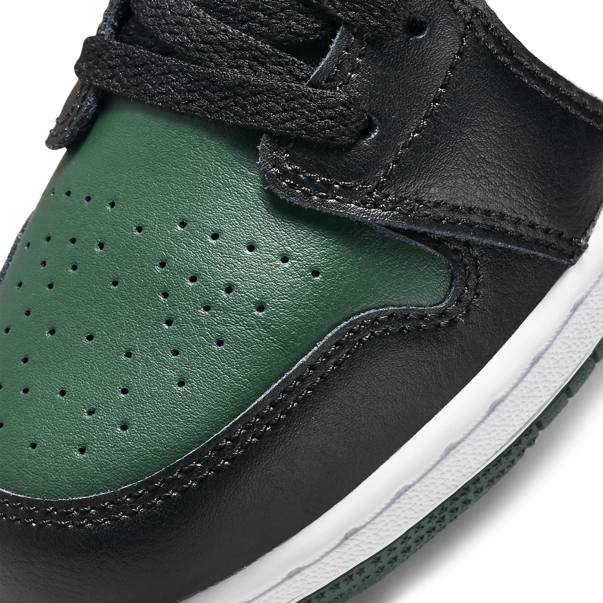 Toe box view of Air Jordan 1 Low Green Toe (GS) 53560-371