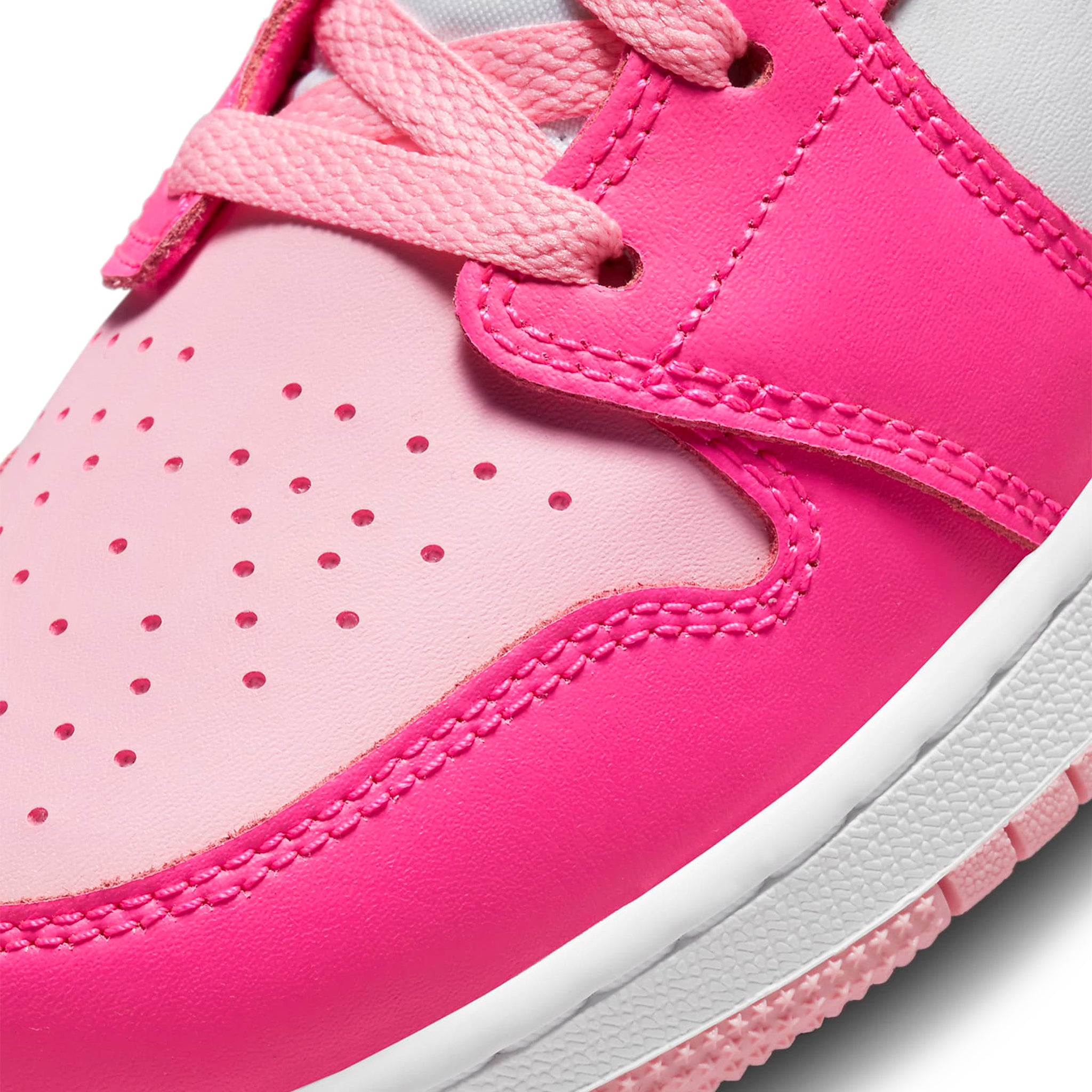 Toe view of Air Jordan 1 Mid Fierce Pink (GS) FD8780-116