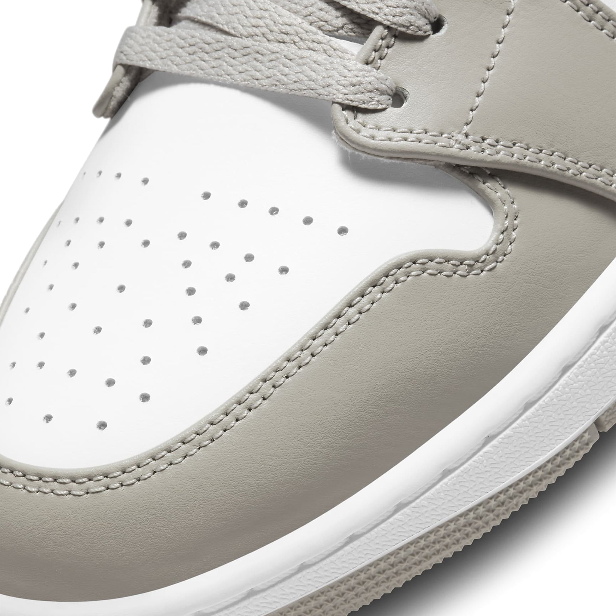 Toe box view of Air Jordan 1 Mid Linen 554724-082