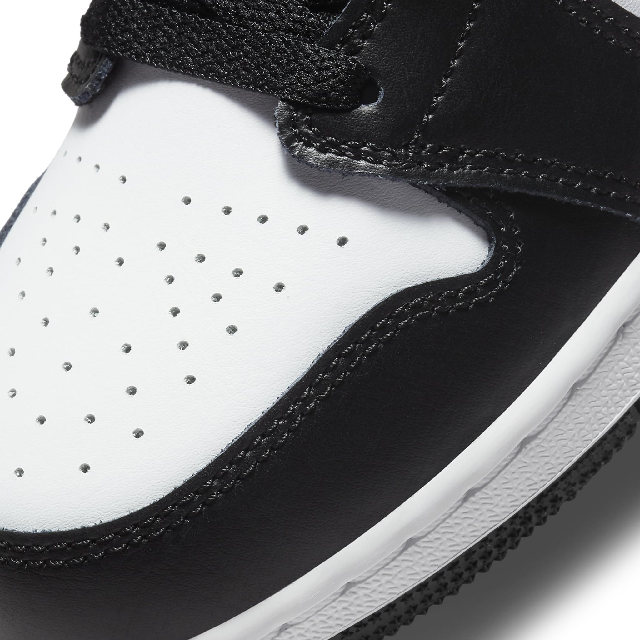 Toe box view of Air Jordan 1 Mid Racer Blue 2.0 (GS) 554725-140