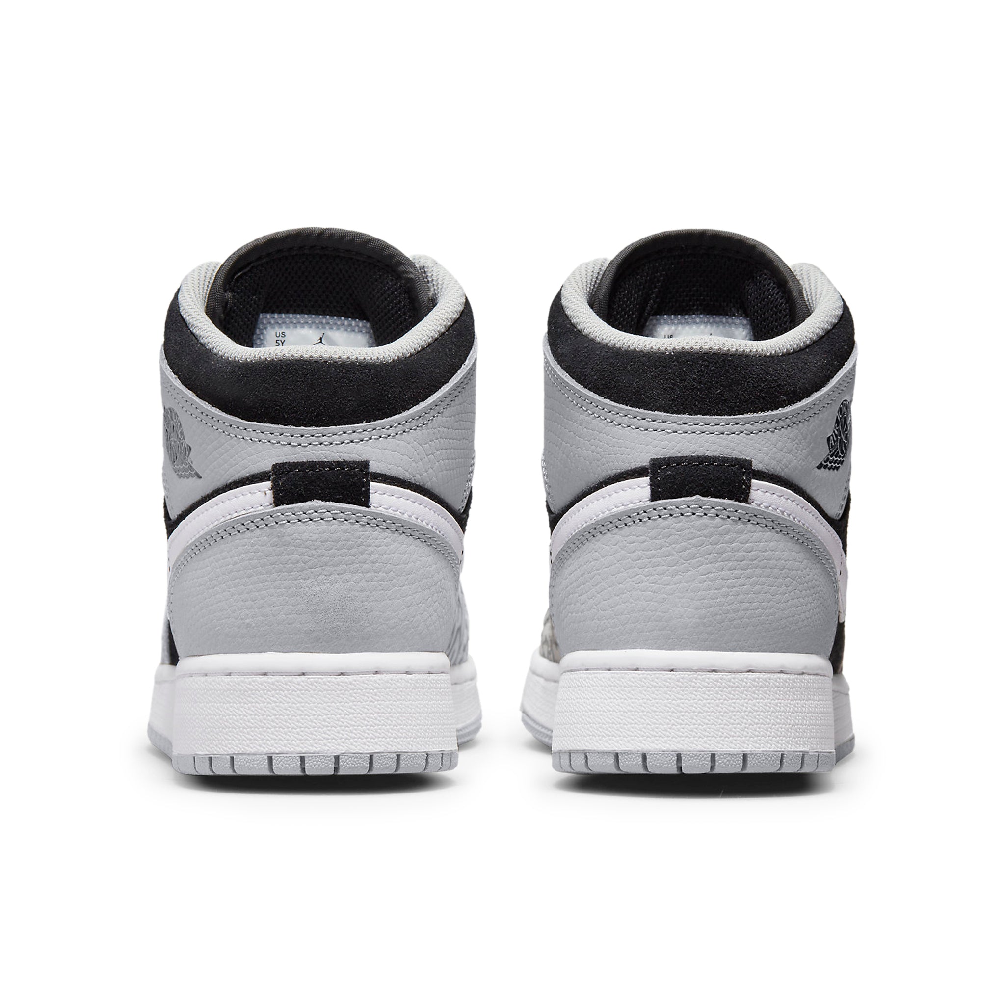 Heel view of Air Jordan 1 Mid SE Elephant Print (GS) DM6216-016