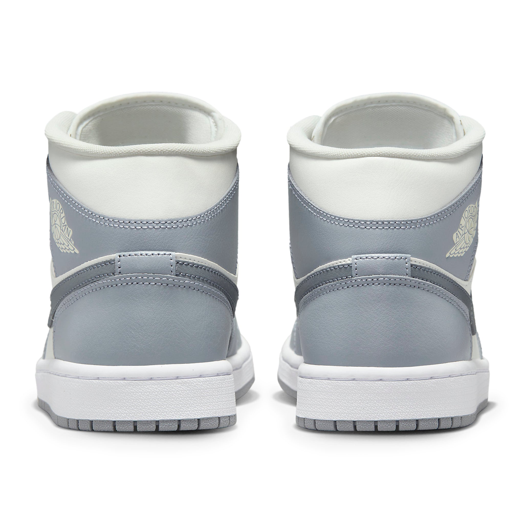 Heel view of Air Jordan 1 Mid Stealth (W) BQ6472-115