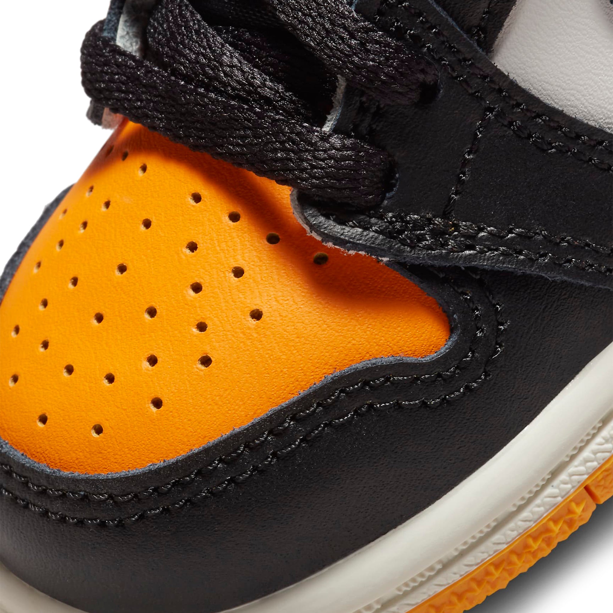 Toe box view of Air Jordan 1 Retro High OG Yellow Toe Taxi (TD) AQ2665-711