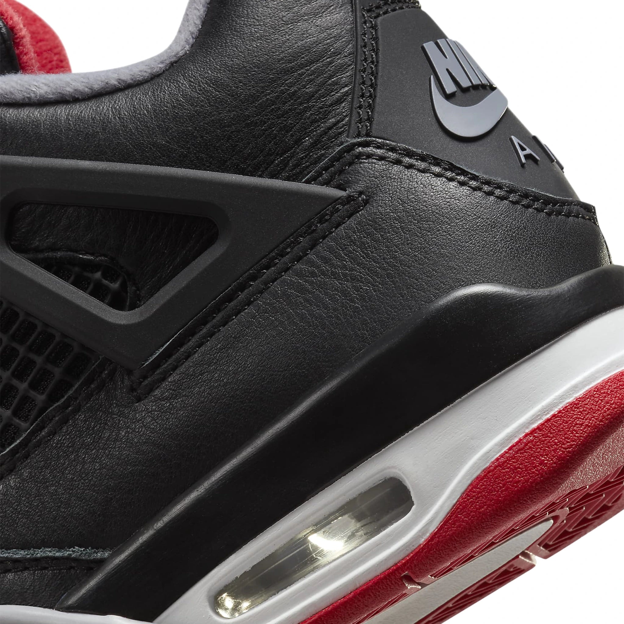 Heel view of Air Jordan 4 OG Bred Reimagined (GS) FQ8213-006