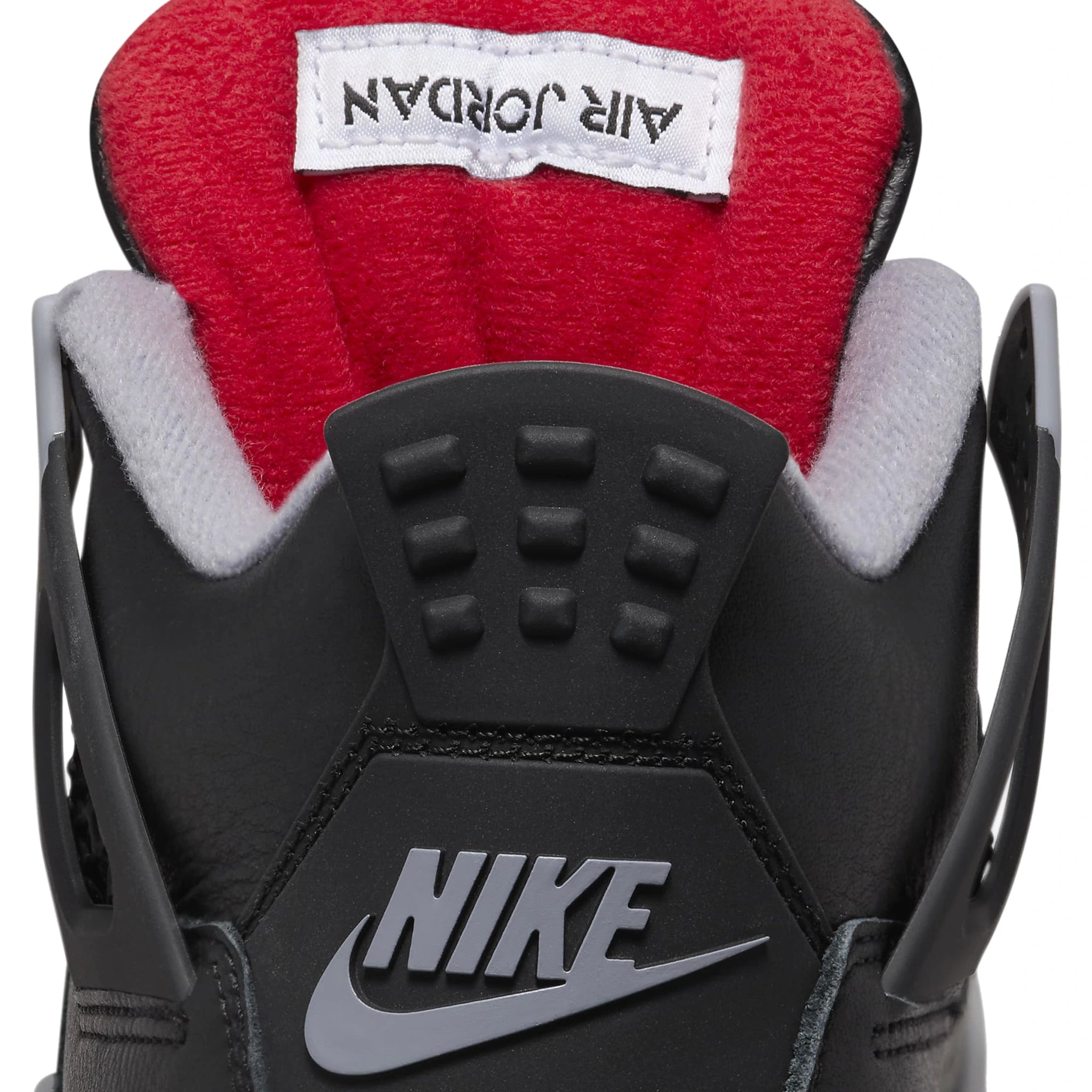 Tongue view of Air Jordan 4 OG Bred Reimagined (GS) FQ8213-006
