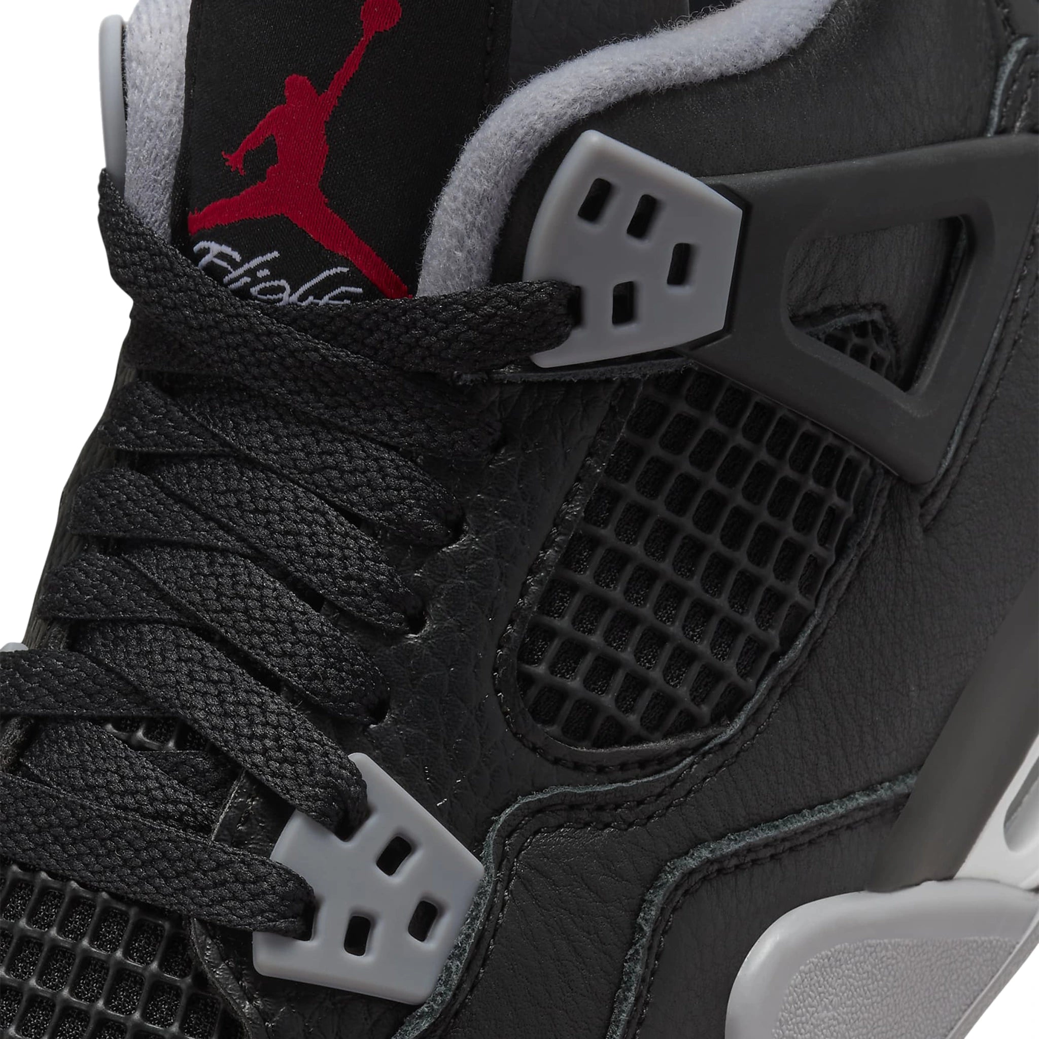 Tongue view of Air Jordan 4 OG Bred Reimagined (GS) FQ8213-006
