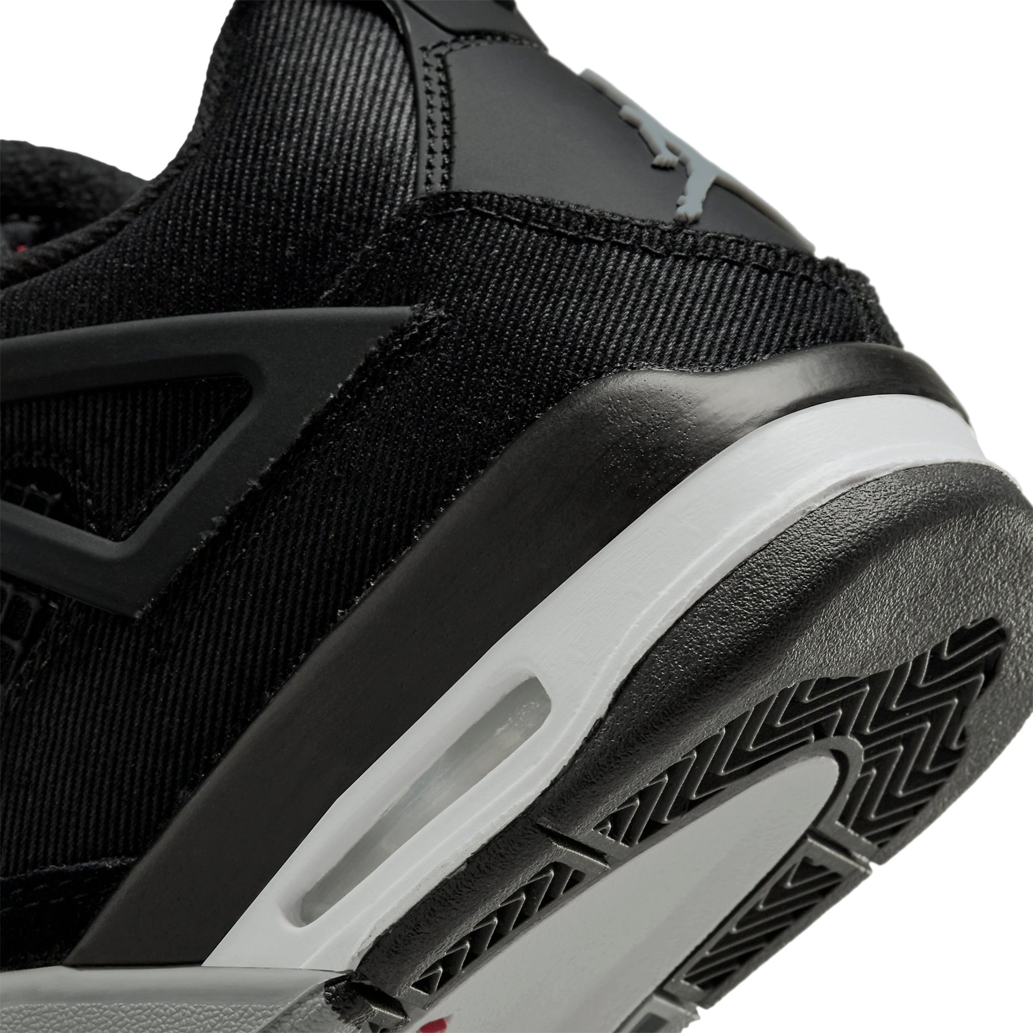 Heel logo view of Air Jordan 4 Retro Black Canvas (GS) DV0553-006