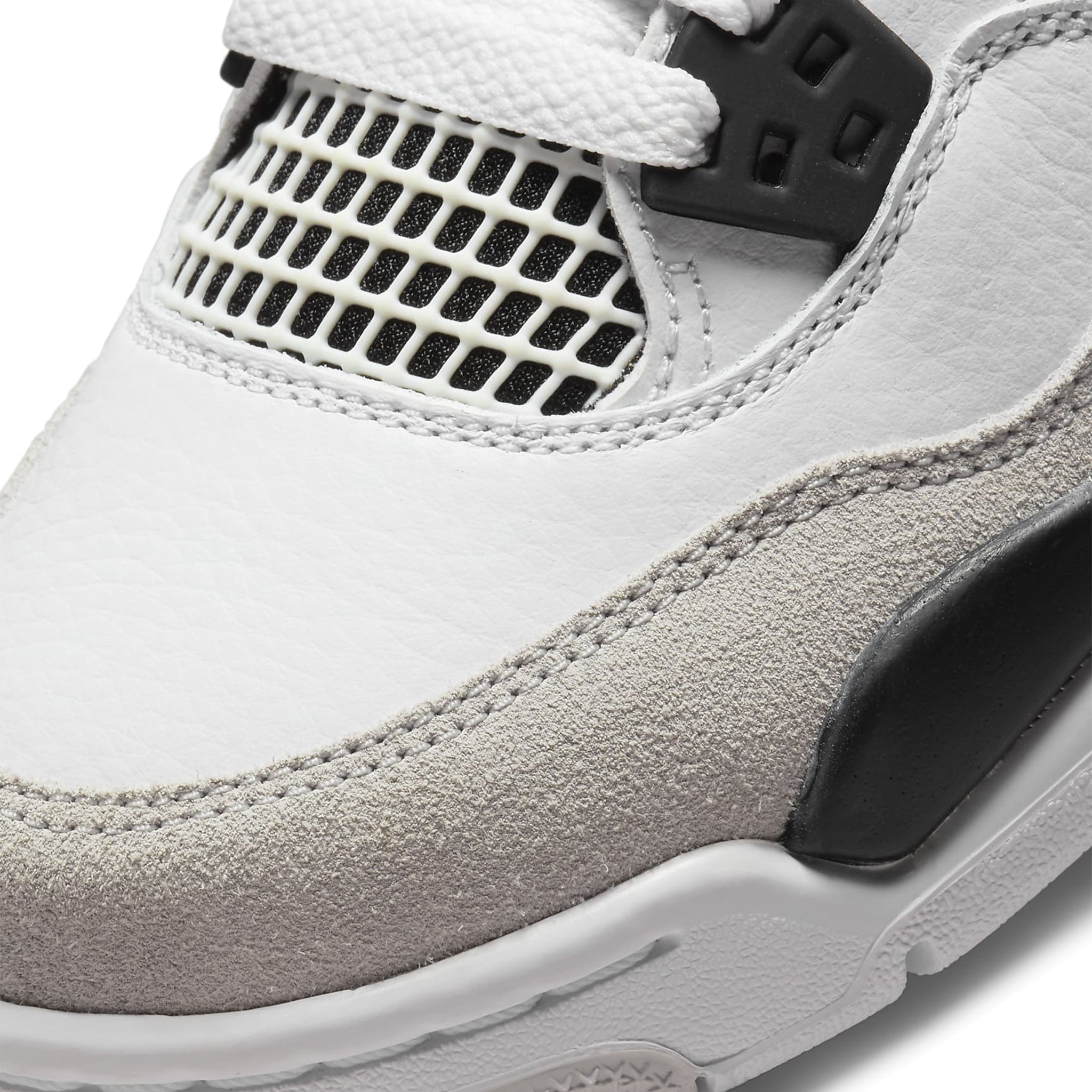 Toe box view of Air Jordan 4 Retro Military Black (GS) 408452-111