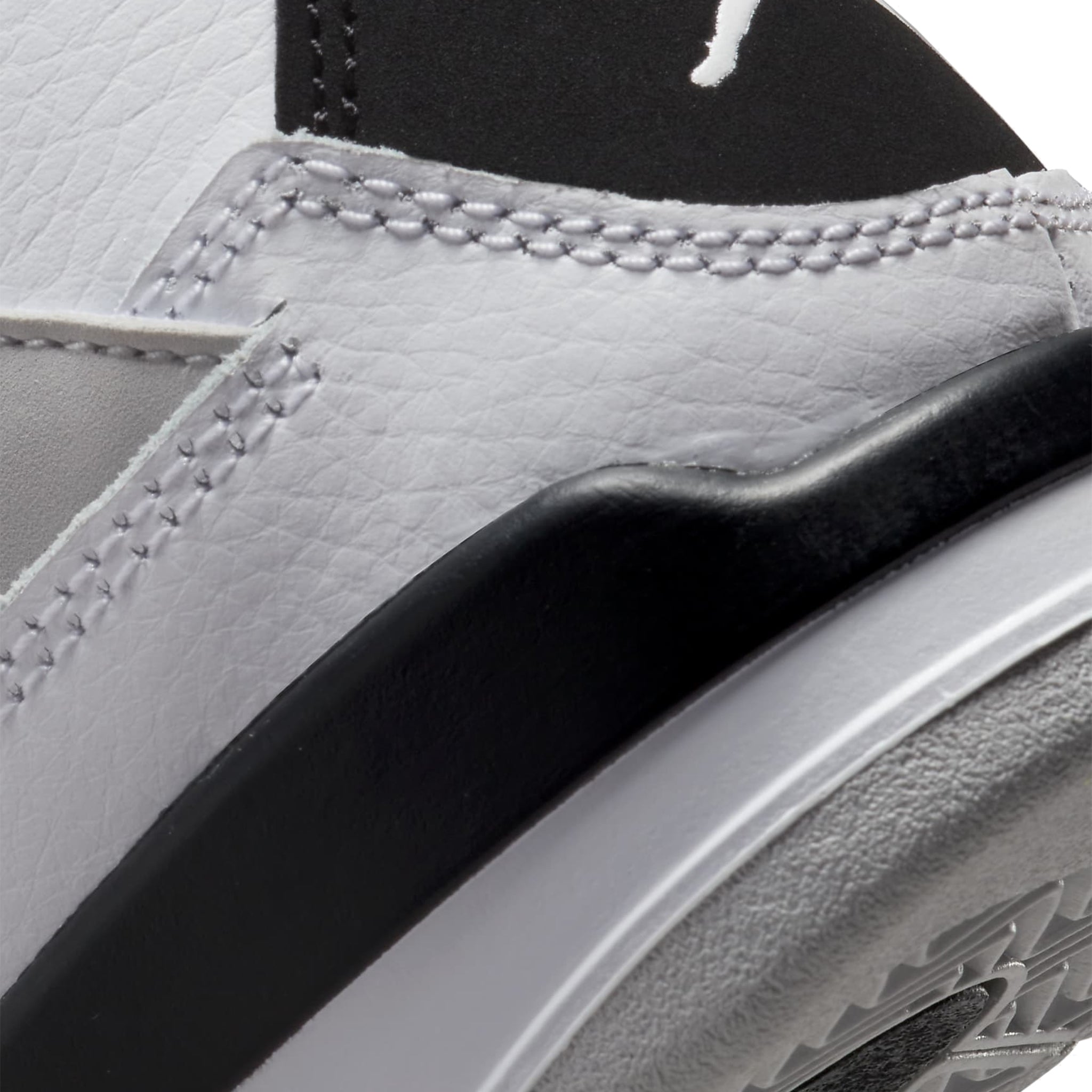 Logo view of Air Jordan 4 Retro Military Black (PS) BQ7669