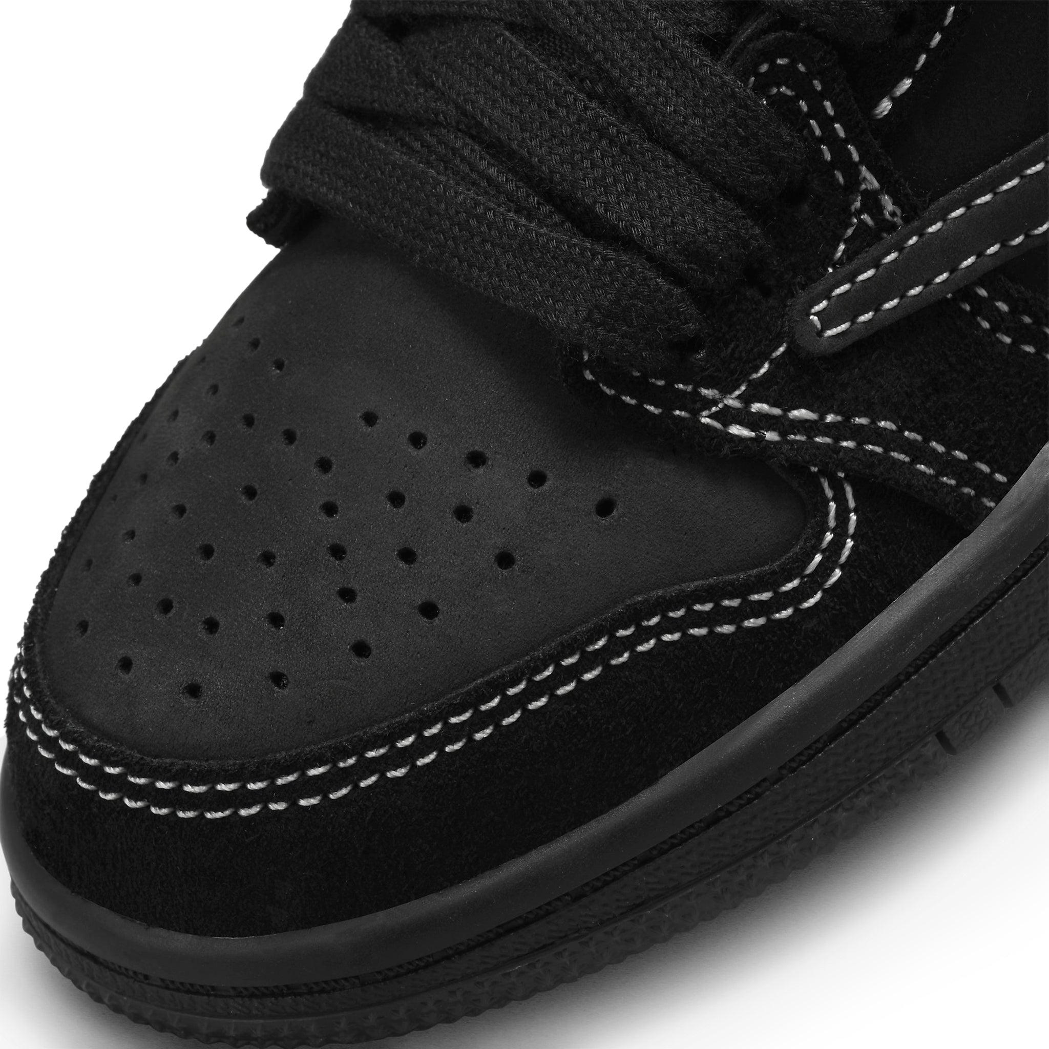 Toe box view of Air Jordan X Travis Scott 1 Low OG SP Black Phantom (PS) DO5442-001