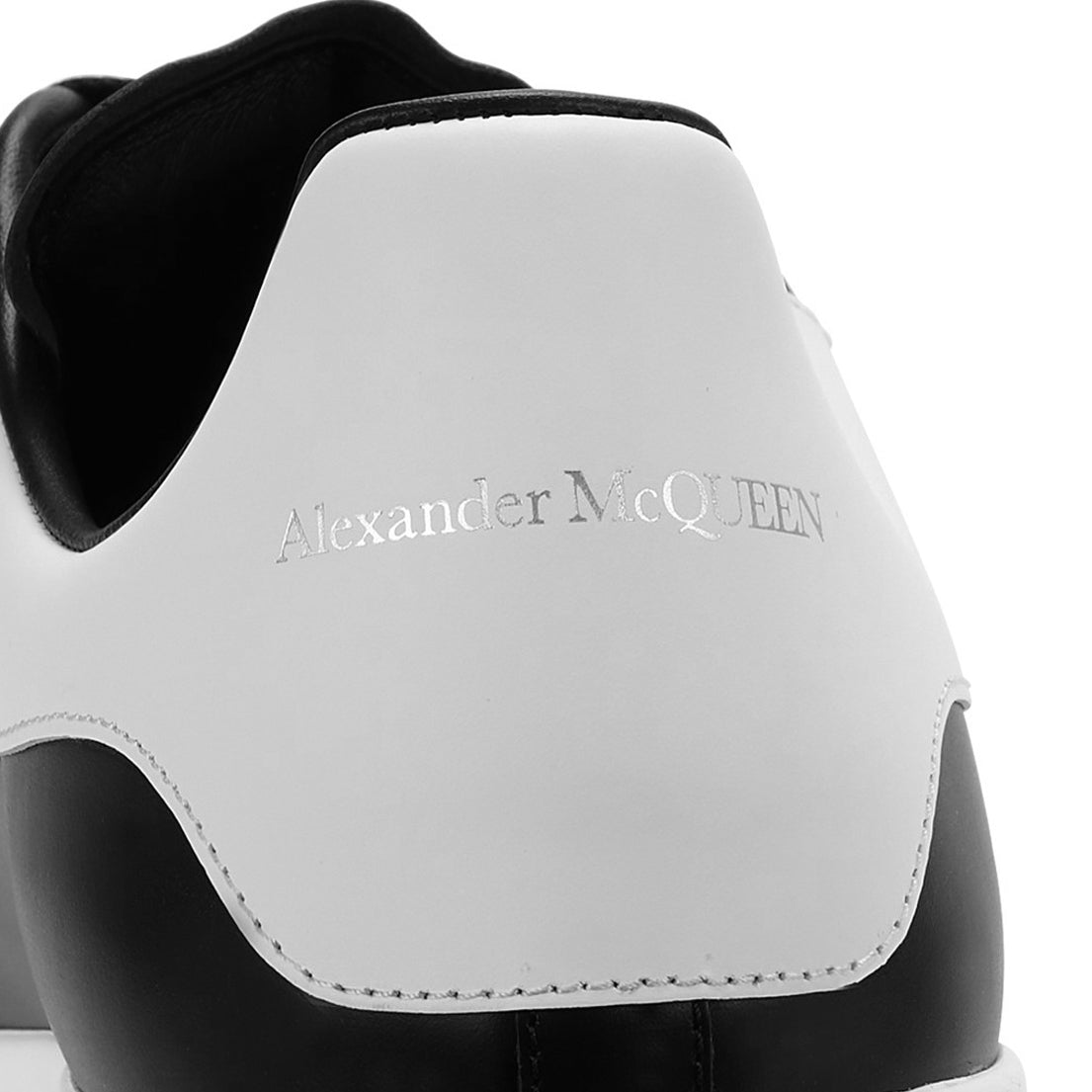 Back tab view of Alexander Mcqueen Raised Sole Black White Sneaker