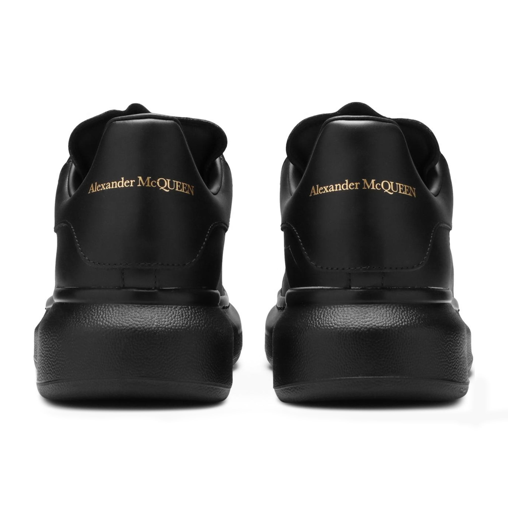 BAck view of Alexander Mcqueen Raised Sole Triple Black Sneaker
