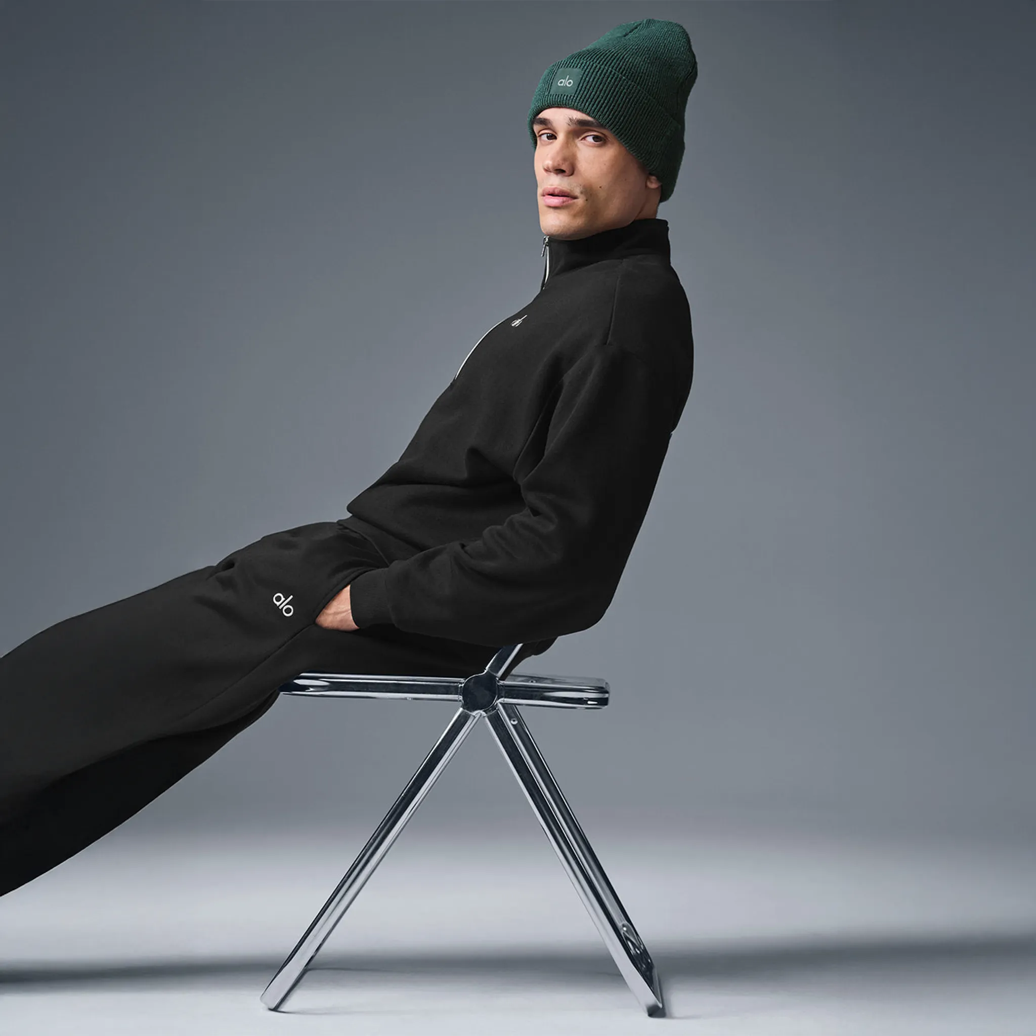 Front Side View of Alo Yoga Accolade 1/4 Zip Black Sweatshirt