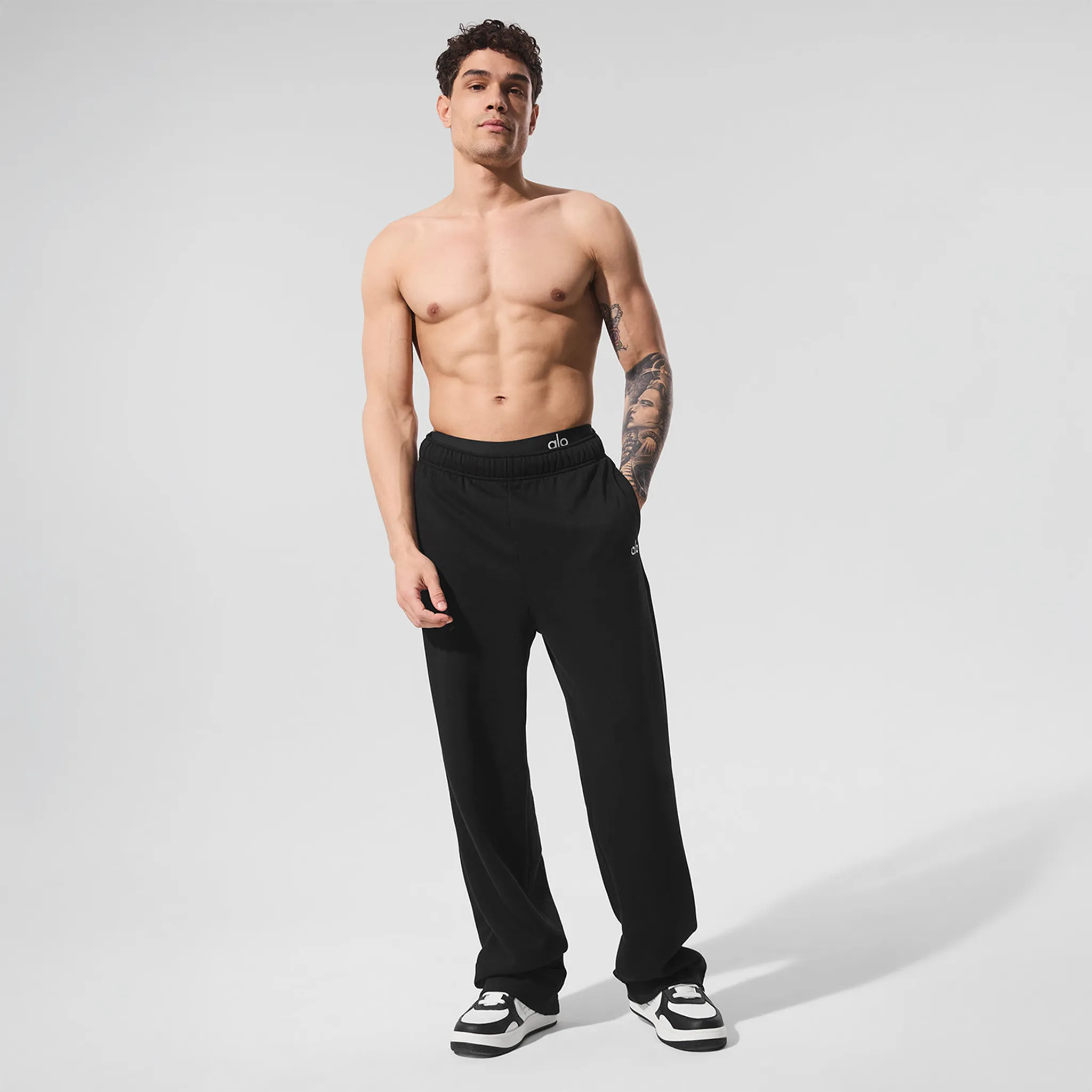 Model Front View of Alo Yoga Accolade Straight Leg Black Sweatpant