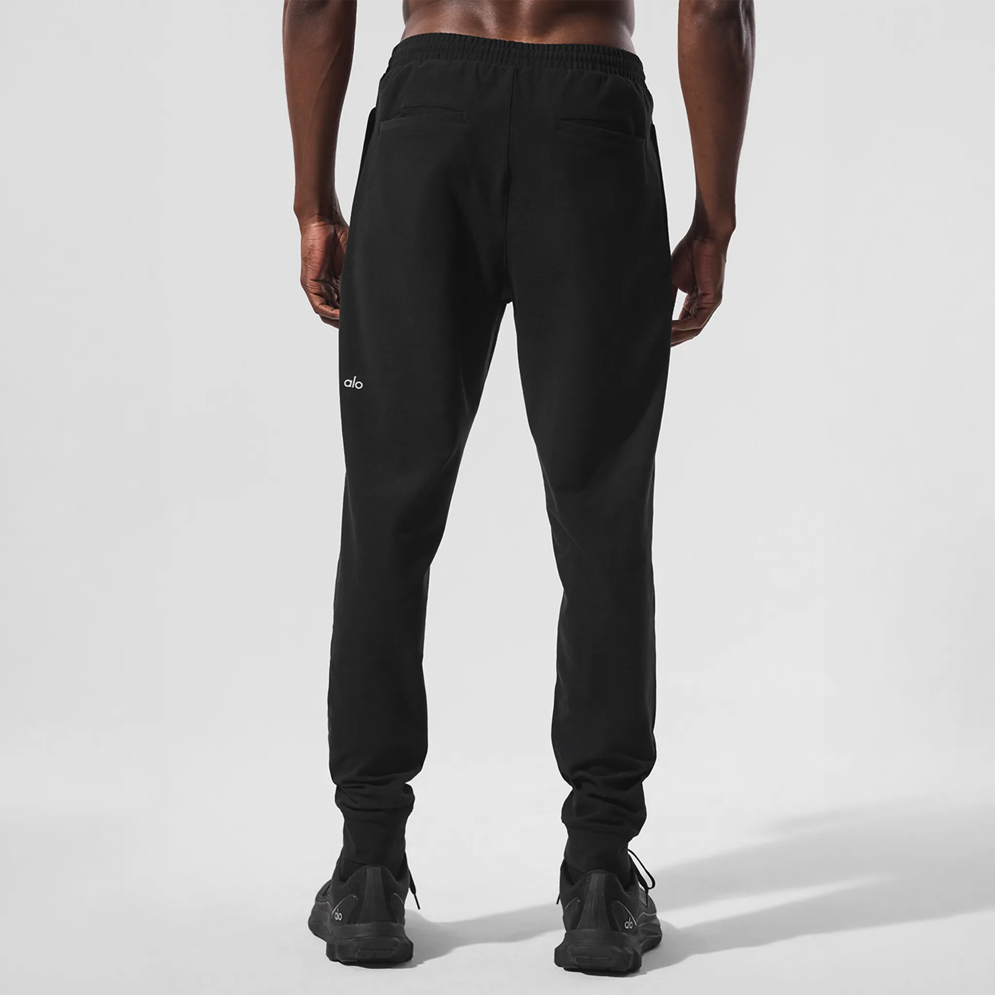 Back View of Alo Yoga Conquer Max Performance Black Sweatpants