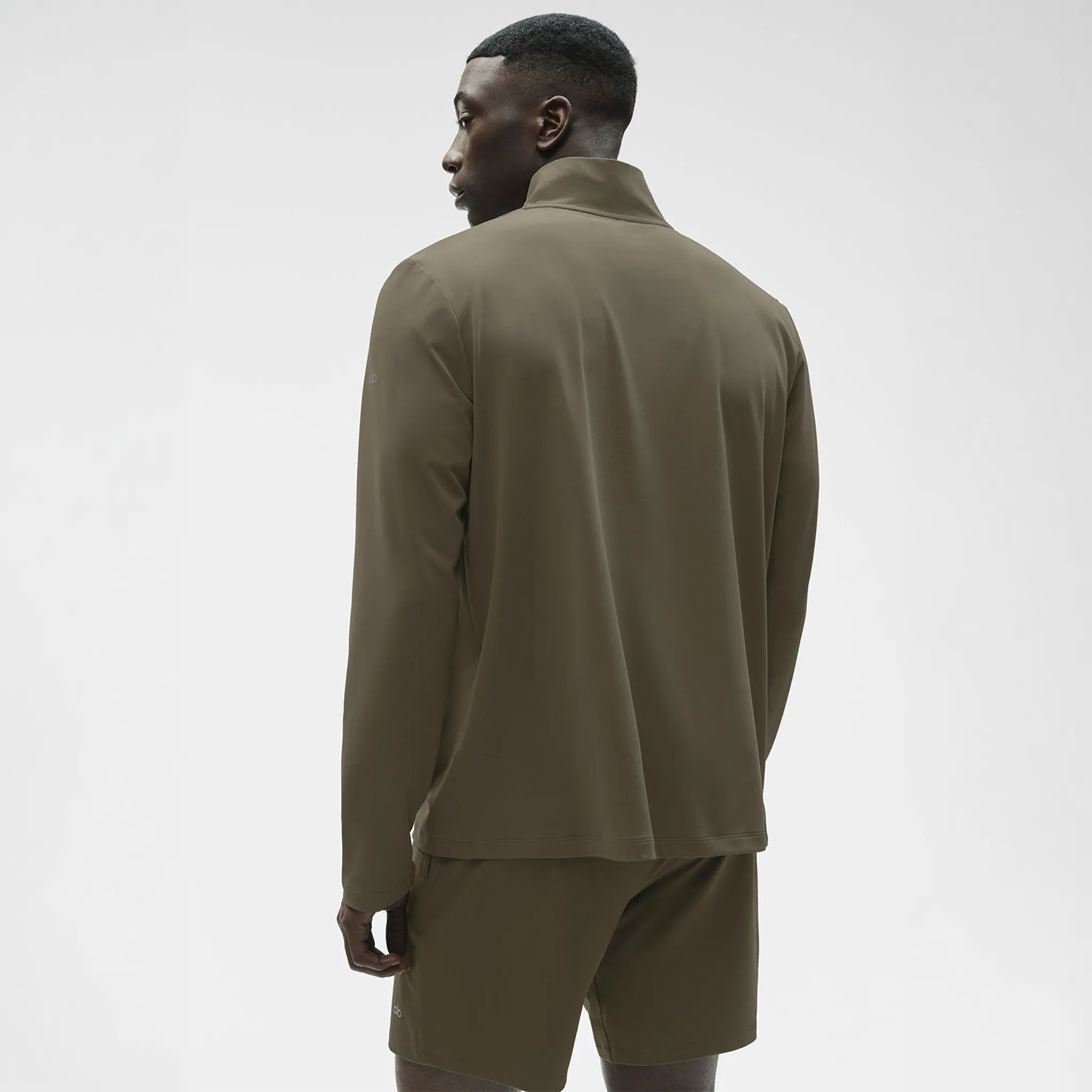 Back View of Alo Yoga Conquer Reform Olive Tree L/S 1/4 Zip