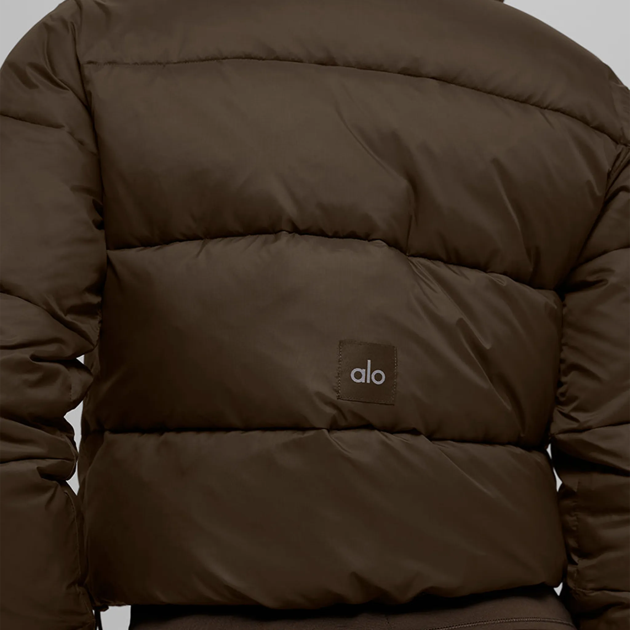 Detailed Back View of Alo Yoga Gold Rush Espresso Puffer Jacket (W)