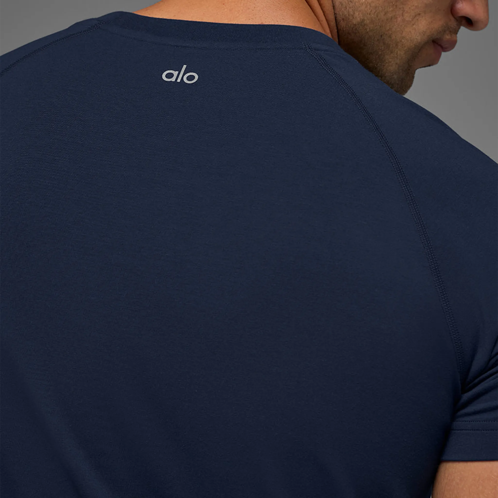 Detailed Back View of Alo Yoga Vapor Navy Crewneck