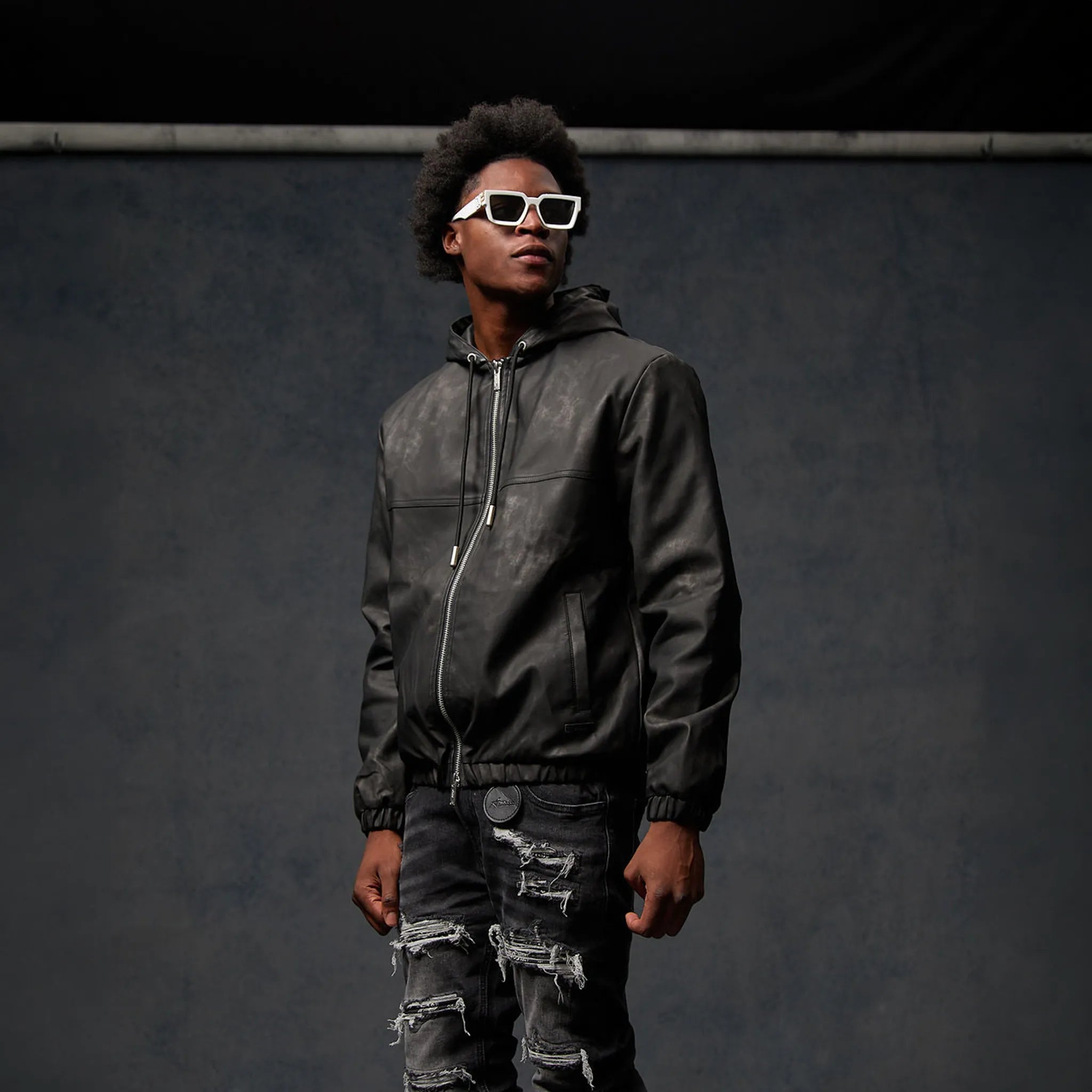 Model Side View of Amicci Rafel Leder Hooded Washed Black Jacket