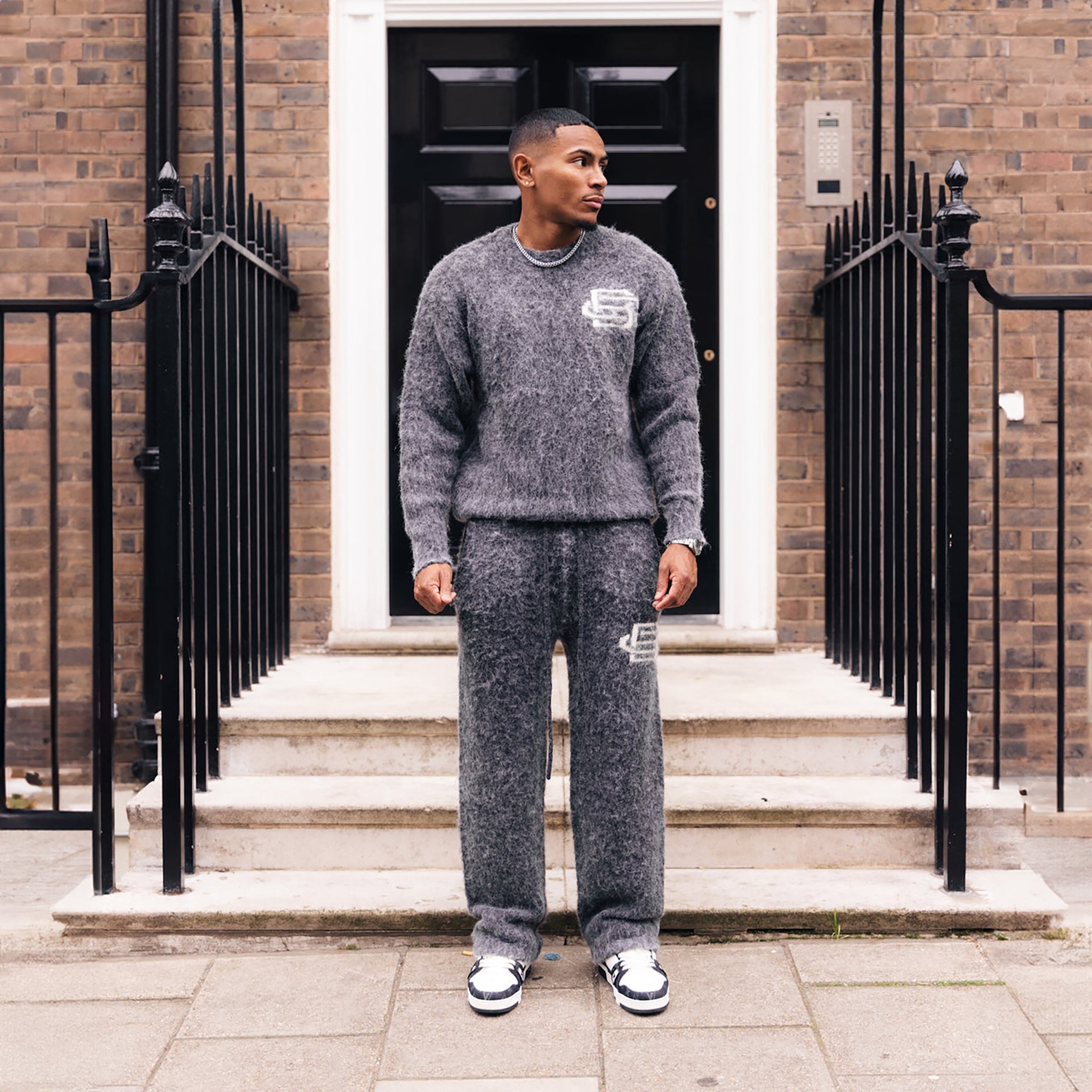 Model Front View of Bénir Clothing Mohair Knit BC Charcoal Sweatshirt MOJUMPCHAR