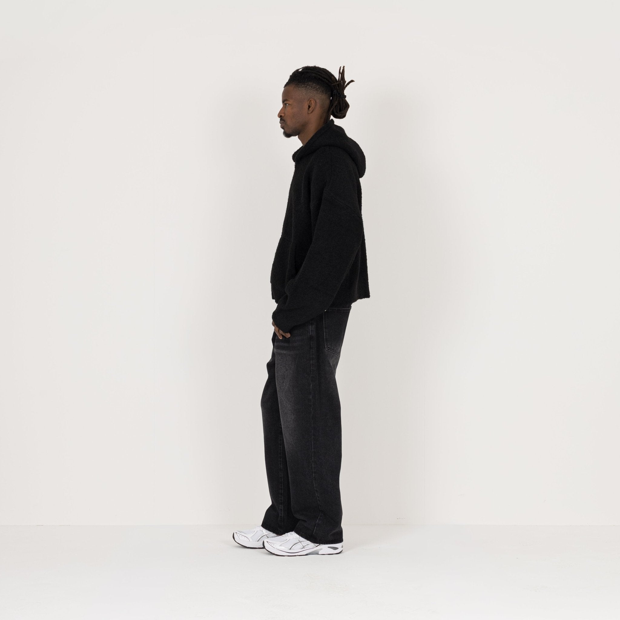 Model Side view of Destructive Bouclé Black ZIP Hoodie