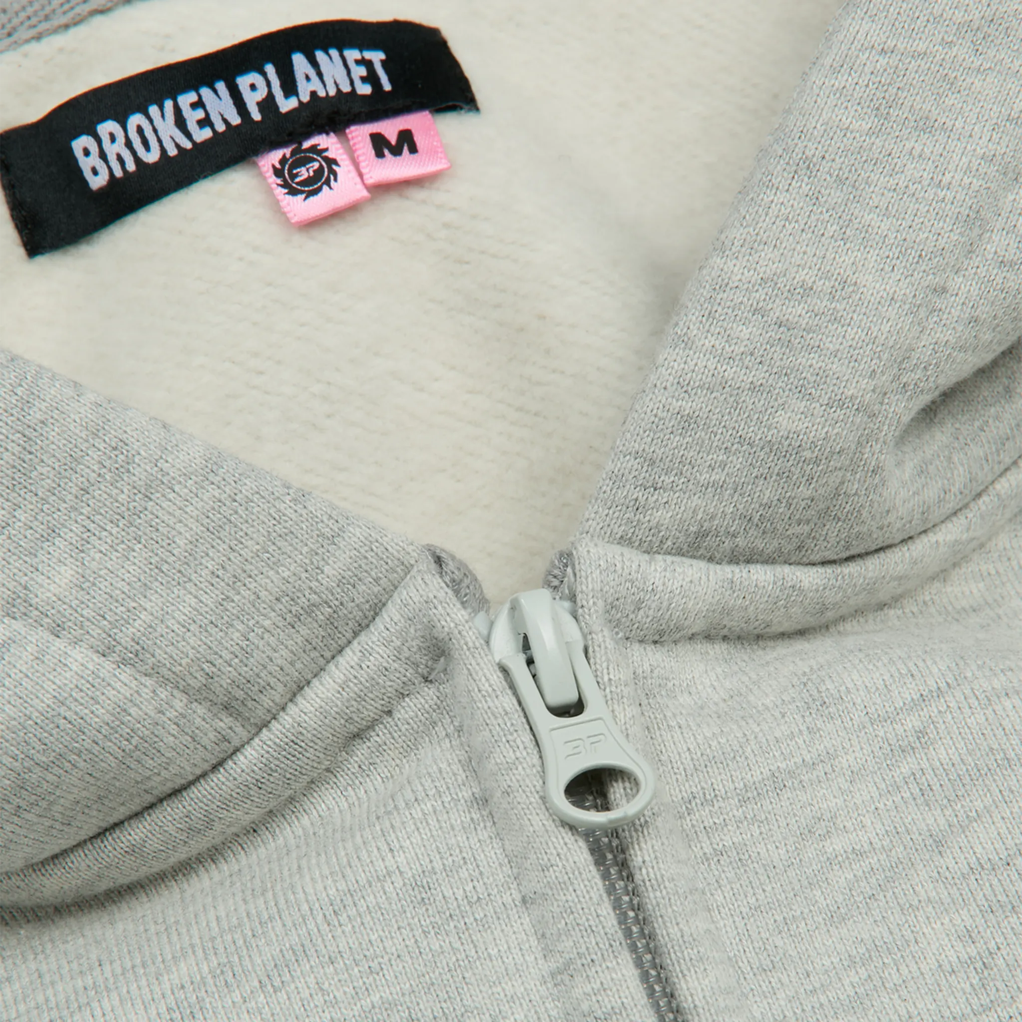 Zip view of Broken Planet Ash Heather Grey Zip-Up Hoodie