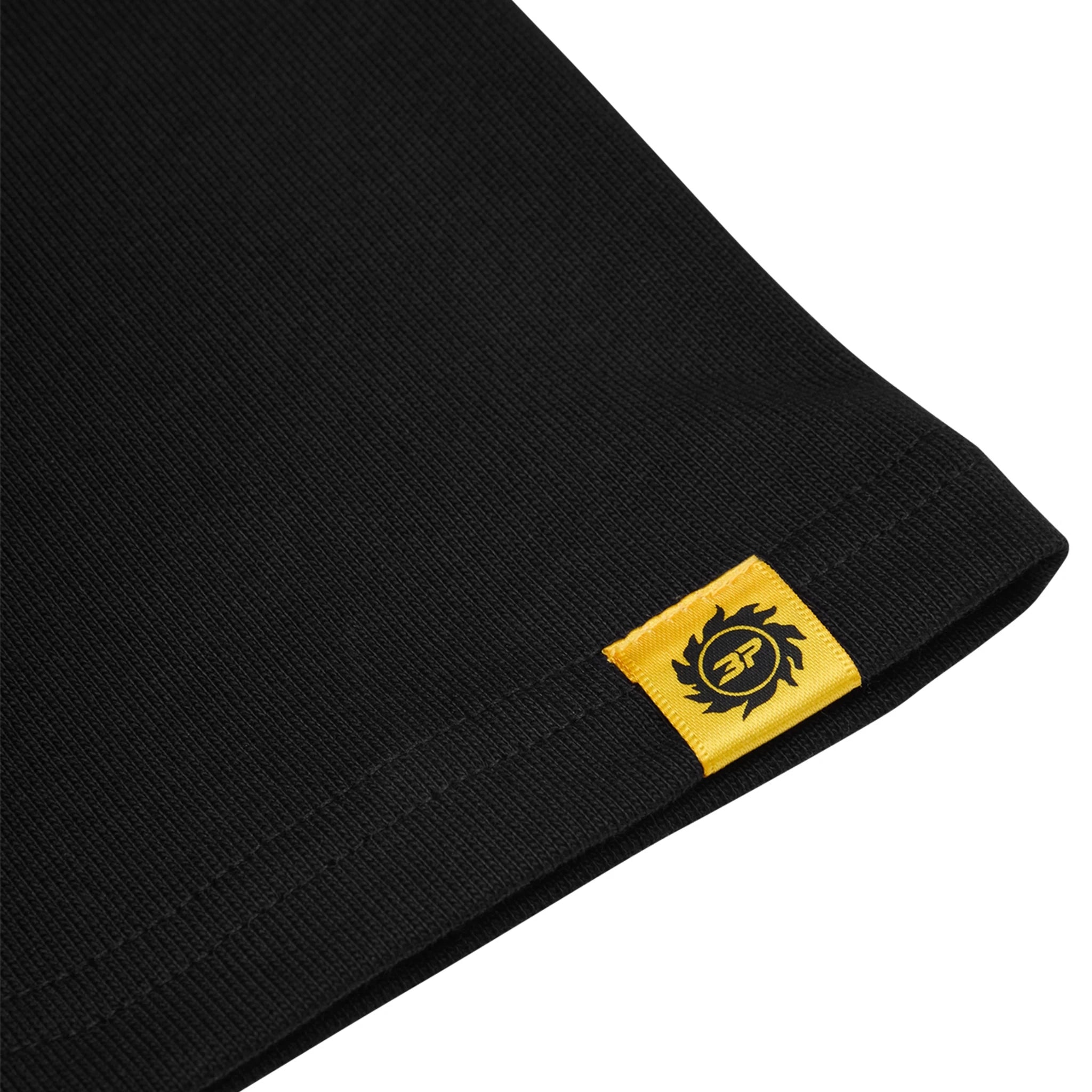 Sleeve view of Broken Planet Crest Midnight Black T Shirt BP-J25-TS-M_BLACK