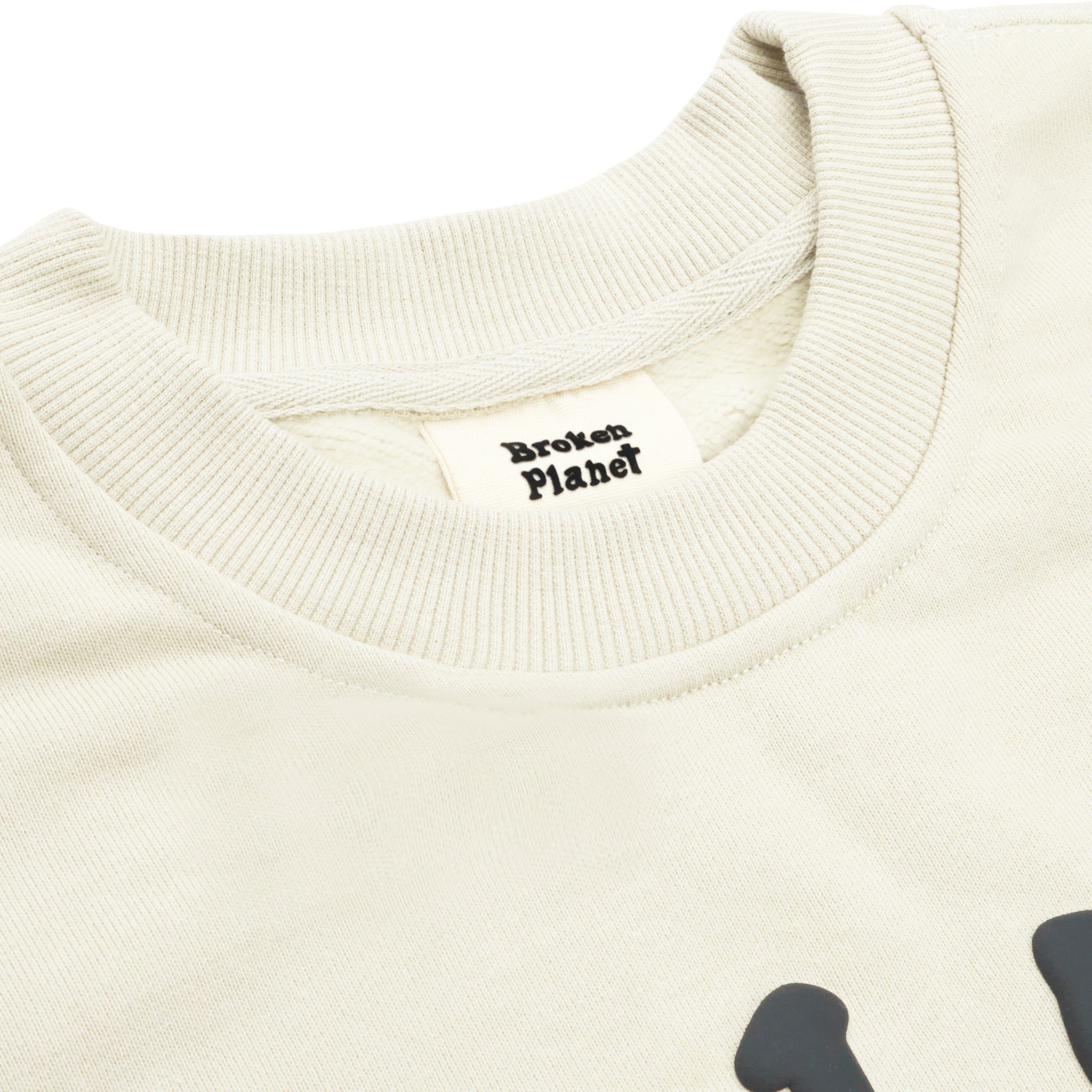 Neck view of Broken Planet Find Your Balance Bone White Crewneck BP-FYB-CN-B_WHITE