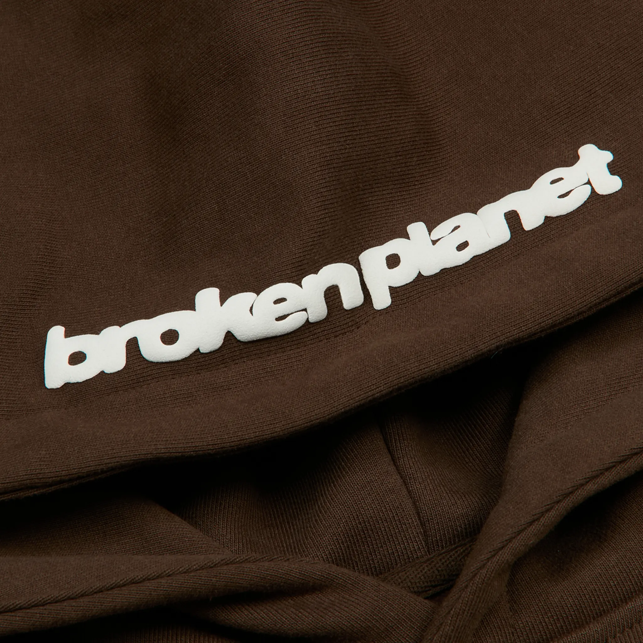 Hood view of Broken Planet It Starts With Luv Mocha Brown Hoodie