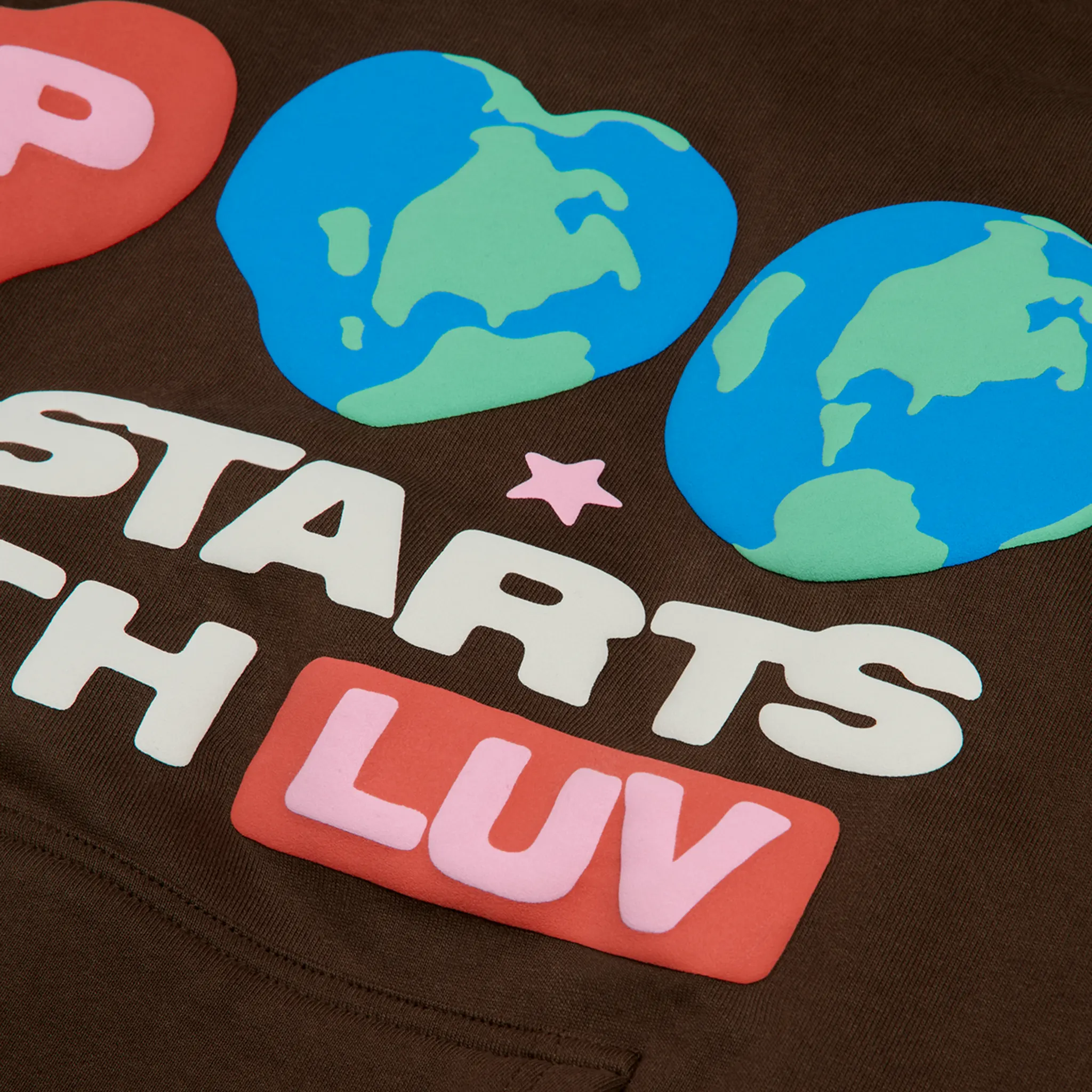 Logo view of Broken Planet It Starts With Luv Mocha Brown Hoodie