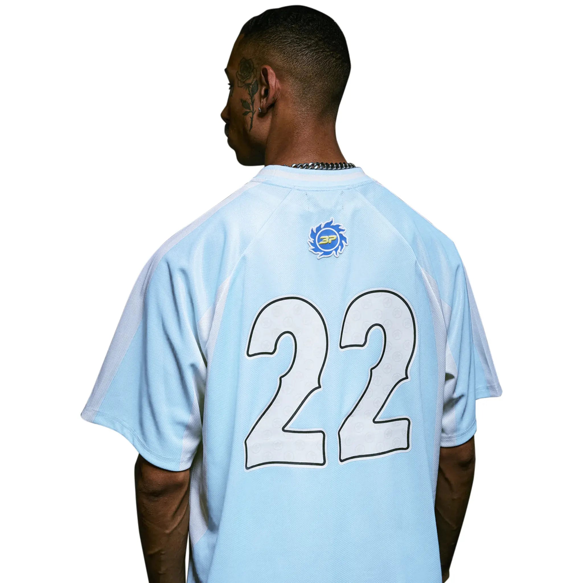 Model detail view of Broken Planet Light Blue Football Jersey