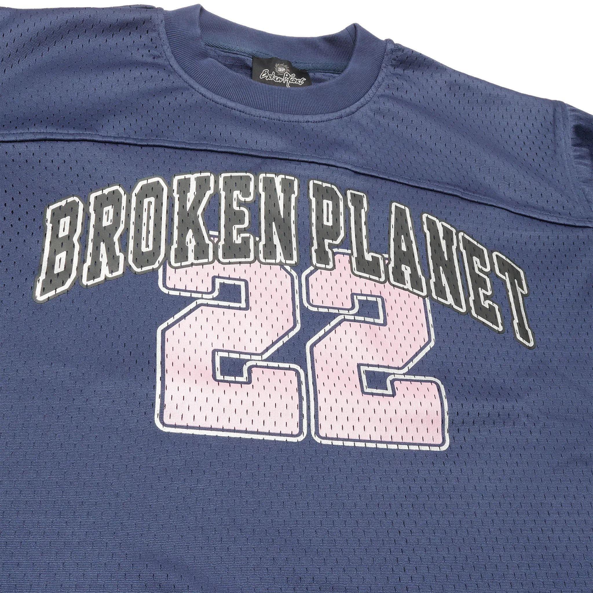 Neck view of Broken Planet Mesh Outerspace Blue Jersey