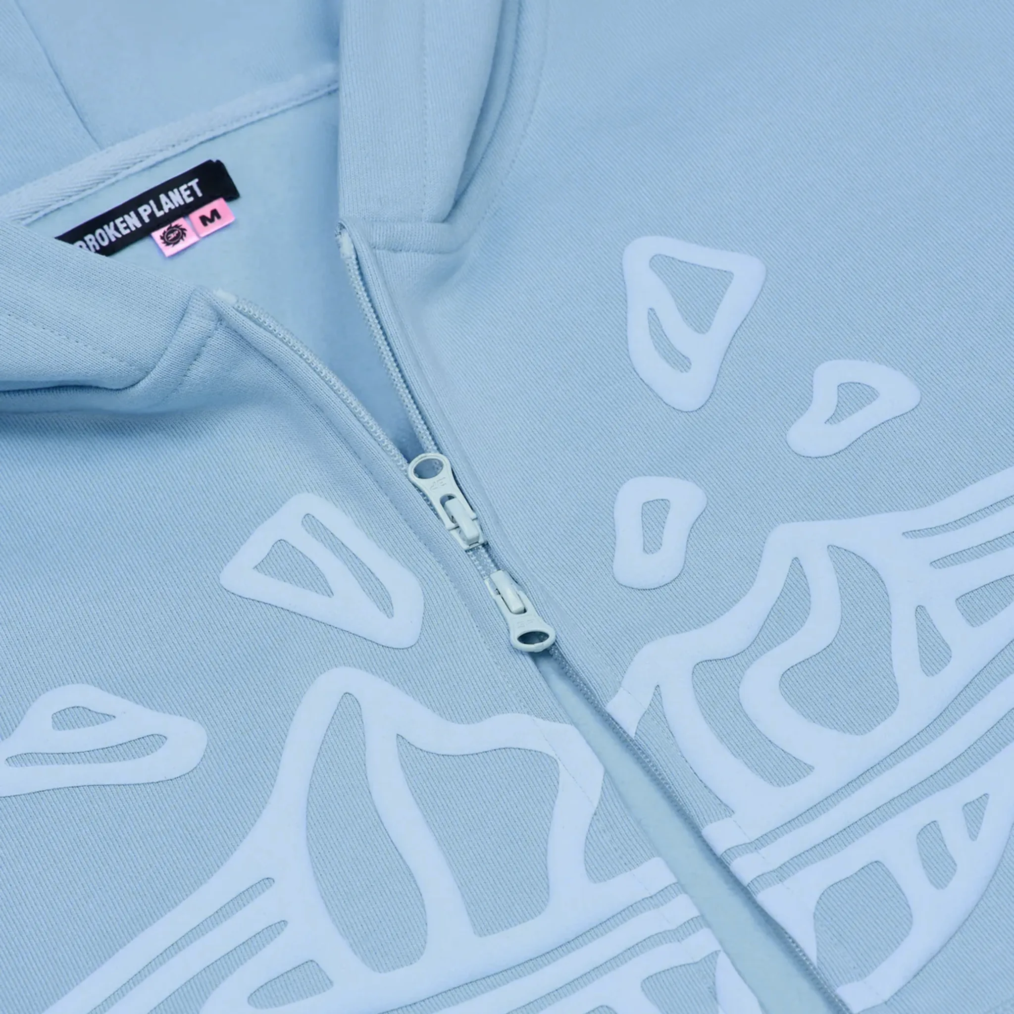 Detailed View of Broken Planet Sky Blue Zip-Up Hoodie