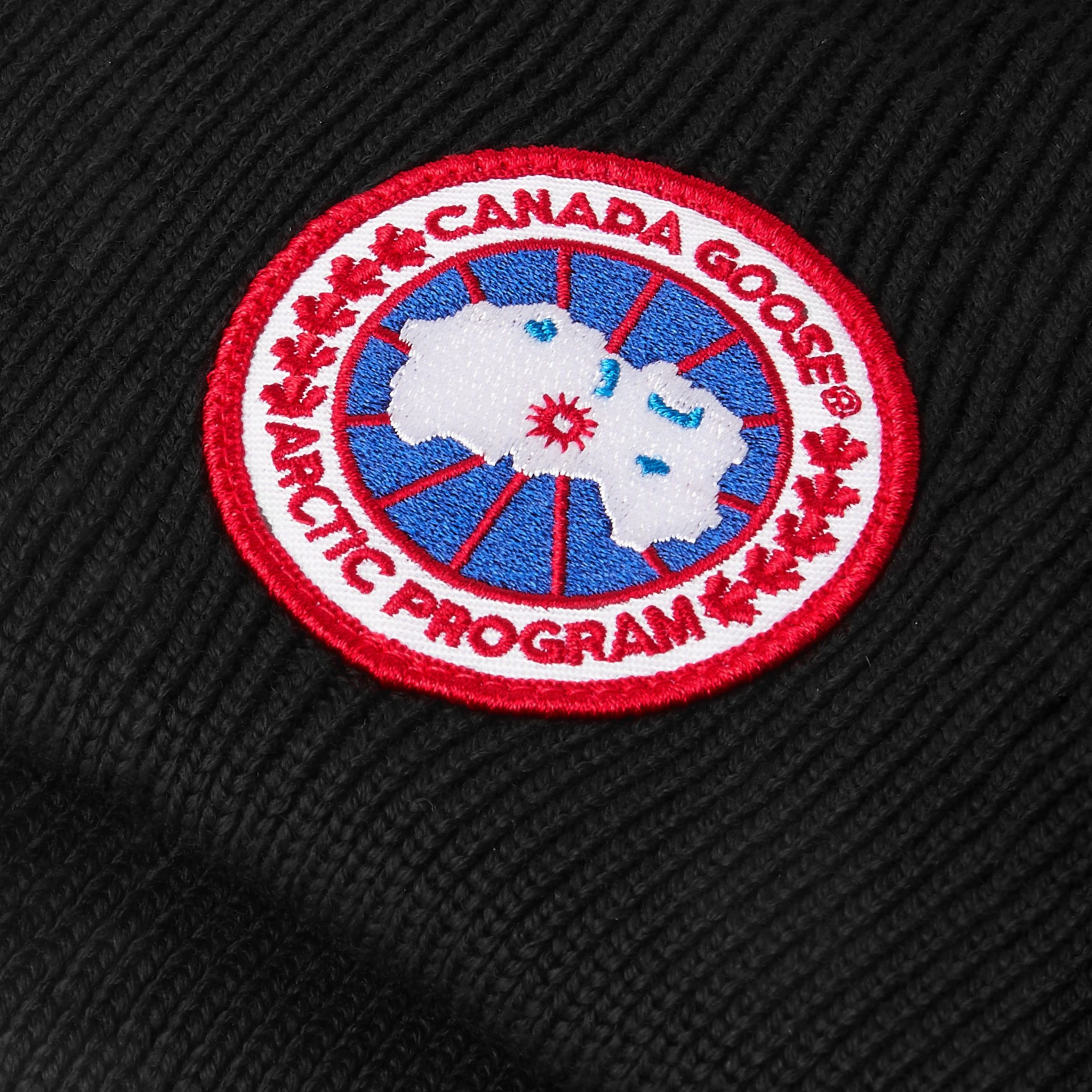 Logo view of Canada Goose Arctic Disc Toque Black Beanie