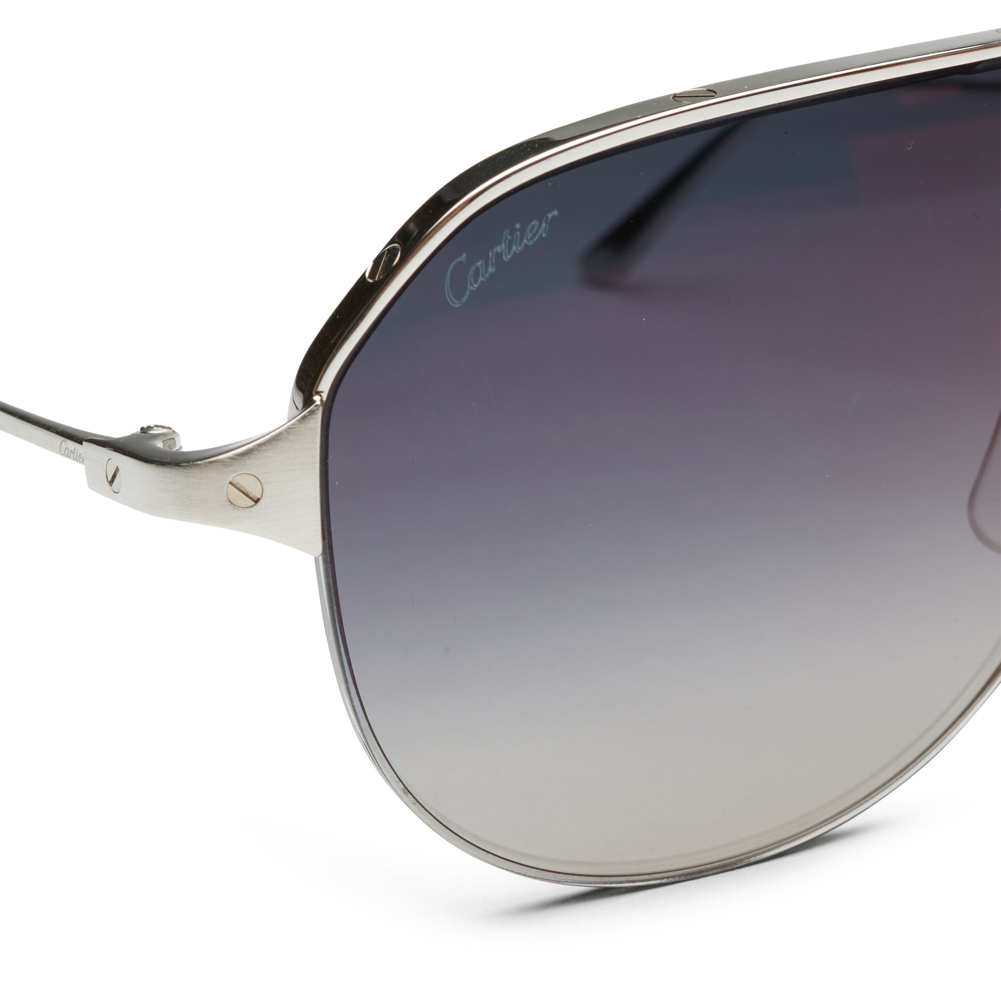 Side lens view of Cartier Eyewear CT0229S-004 Santos De Cartier Silver Sunglasses