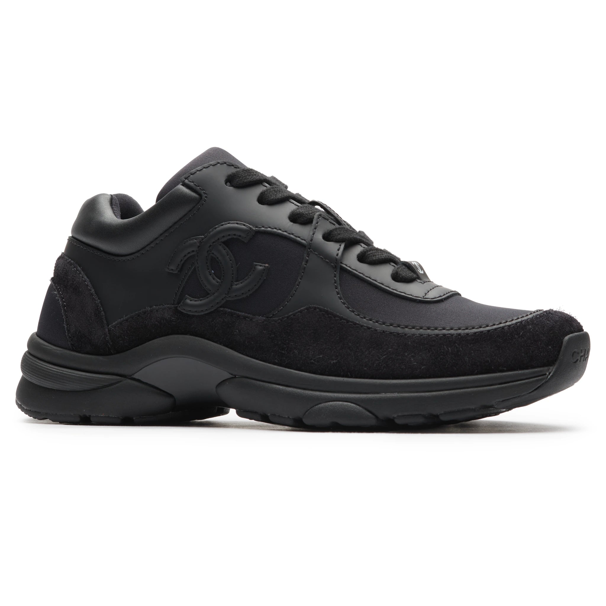 Front side view of Chanel CC Logo Suede Triple Black Sneaker