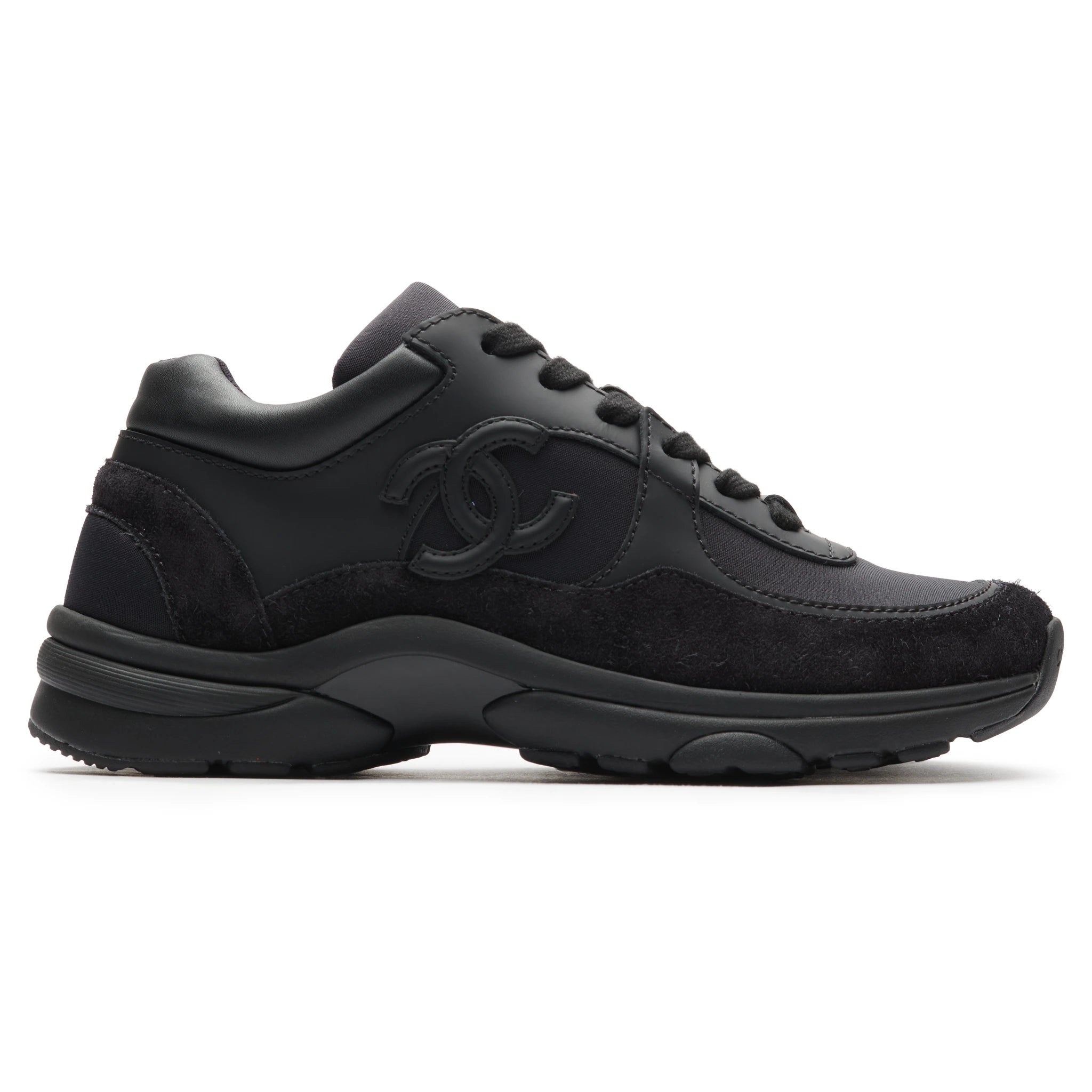 Side view of Chanel CC Logo Suede Triple Black Sneaker